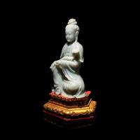 A Chinese Celadon Jade Seated Guanyin, 20th Century — 近代 青玉觀音坐像