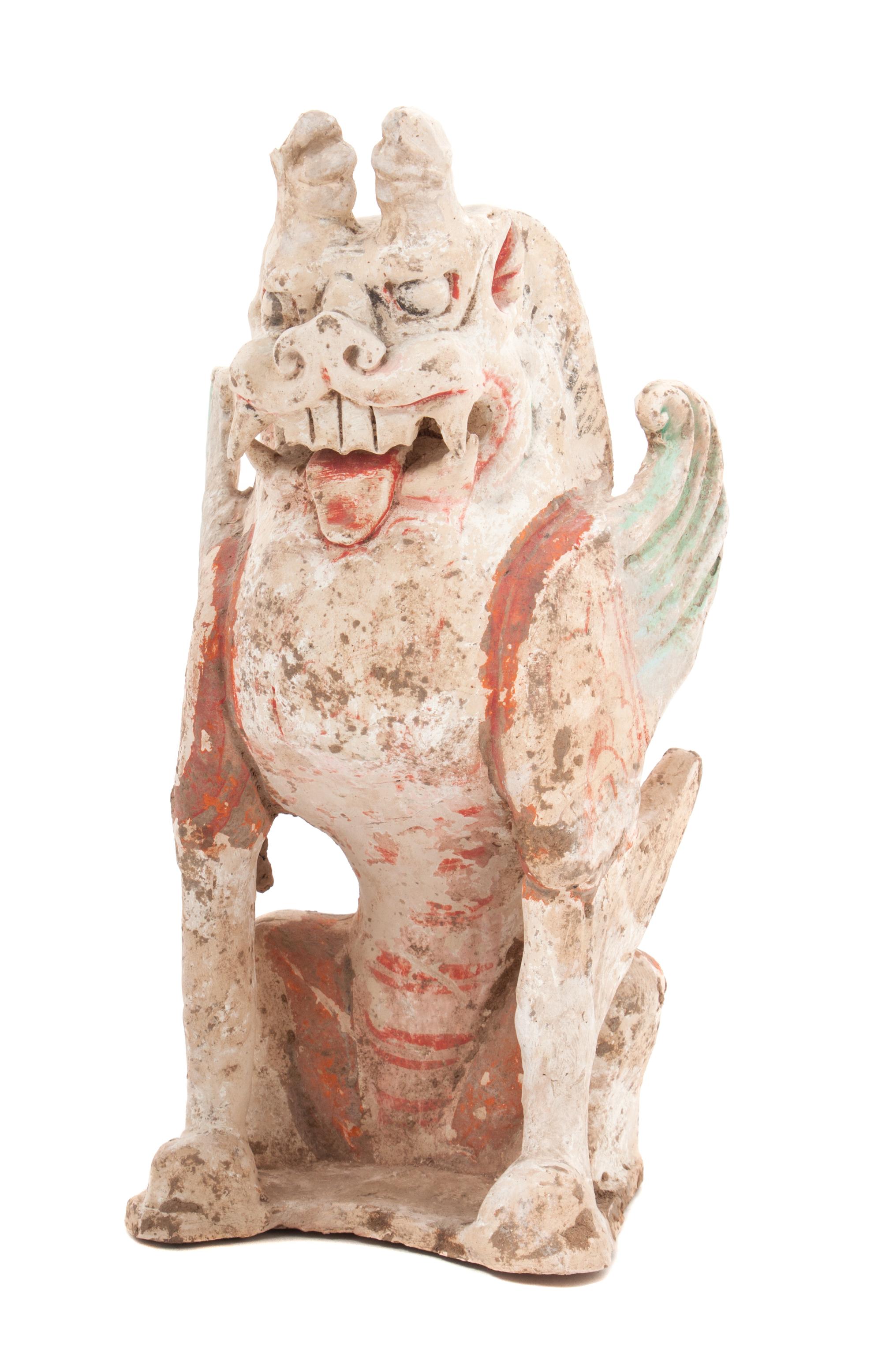 A Foo Dog Height 11 1/2 inches.