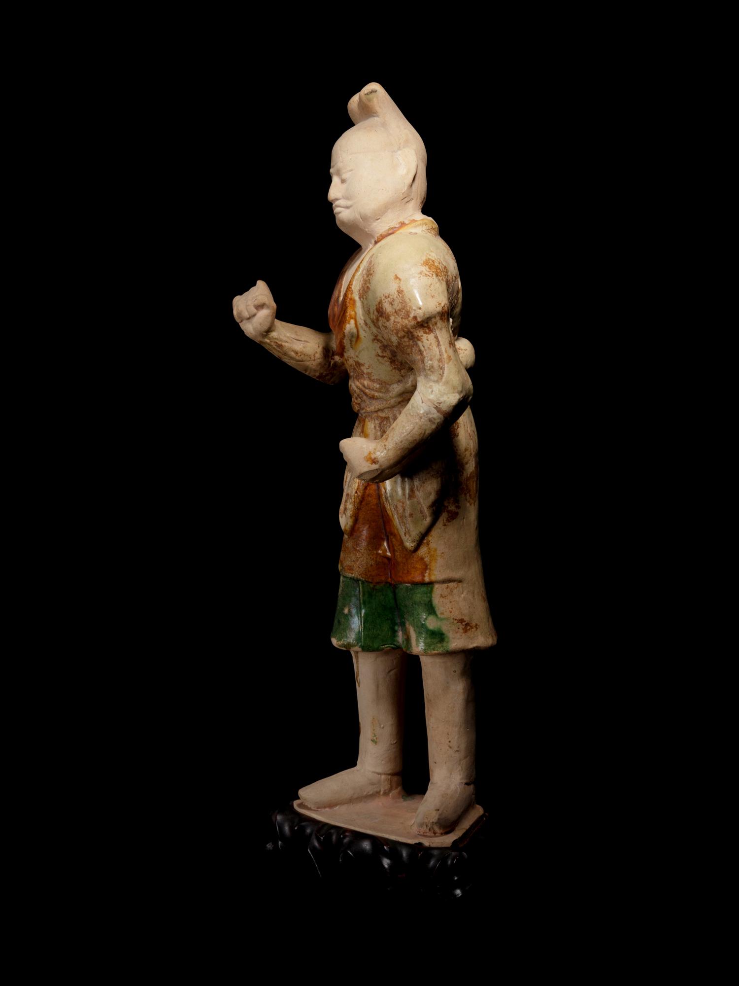 A Sancai Glazed Pottery Figure of a Standing Groom
