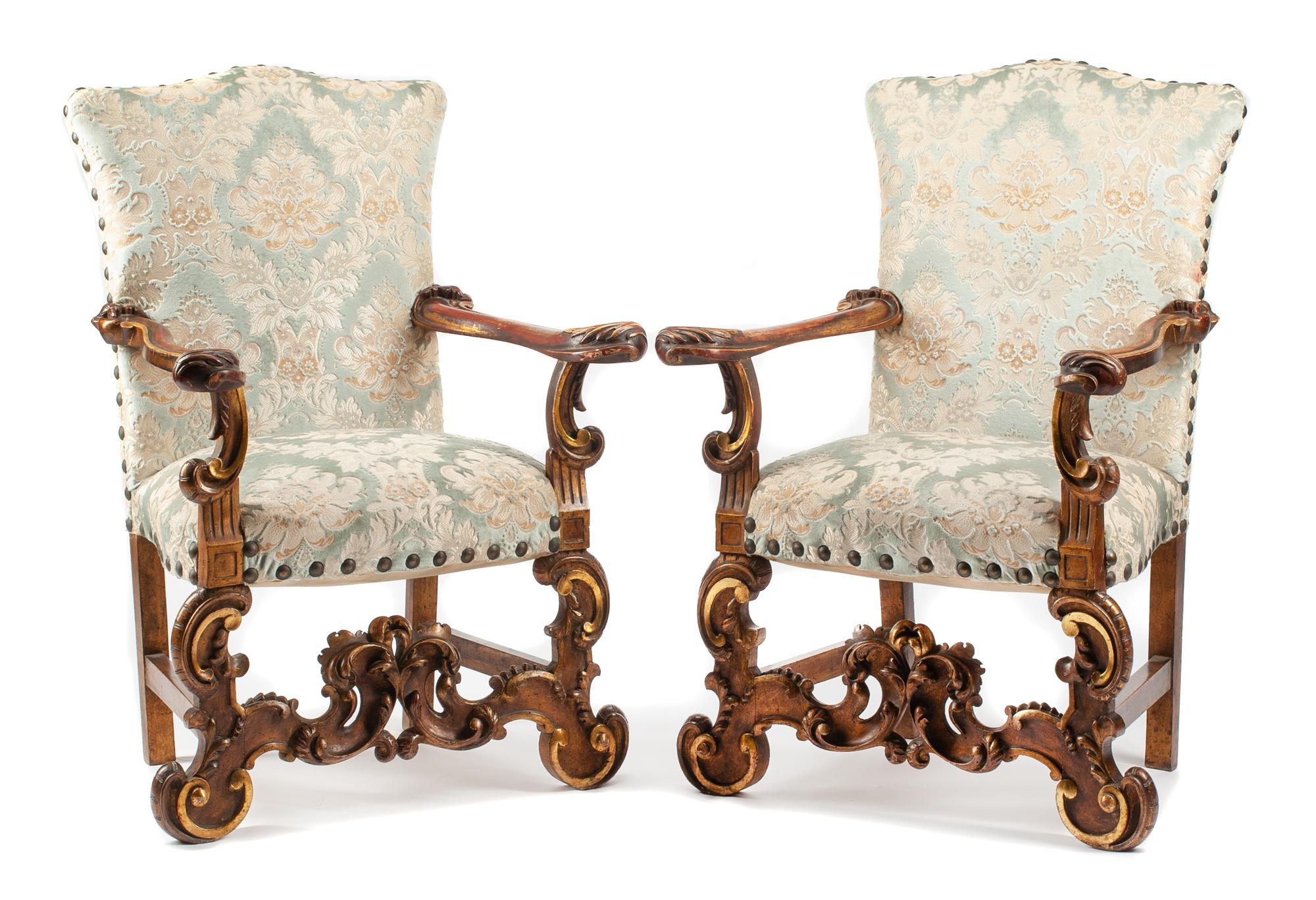 A Pair of Spanish Renaissance Style Painted and Parcel Gilt Armchairs Height 44 inches.