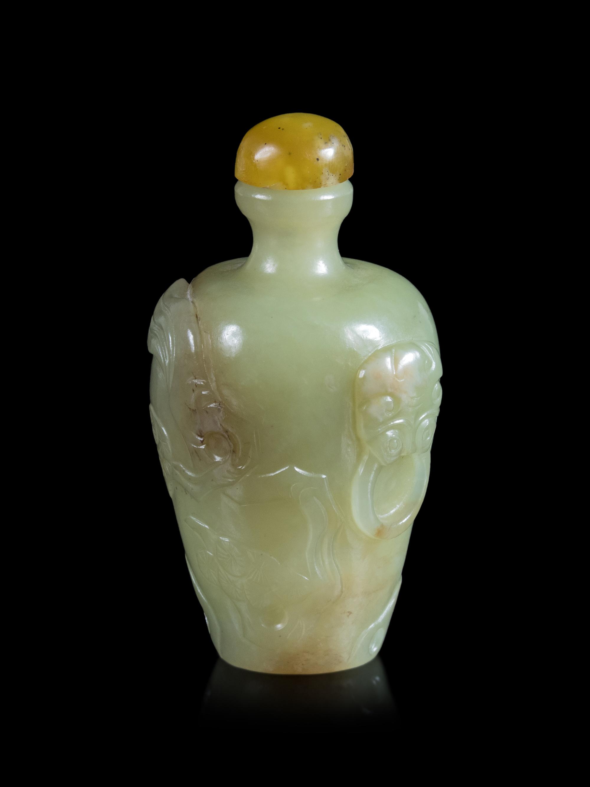 A Carved Yellow Jade 'Crane and Pine' Snuff Bottle