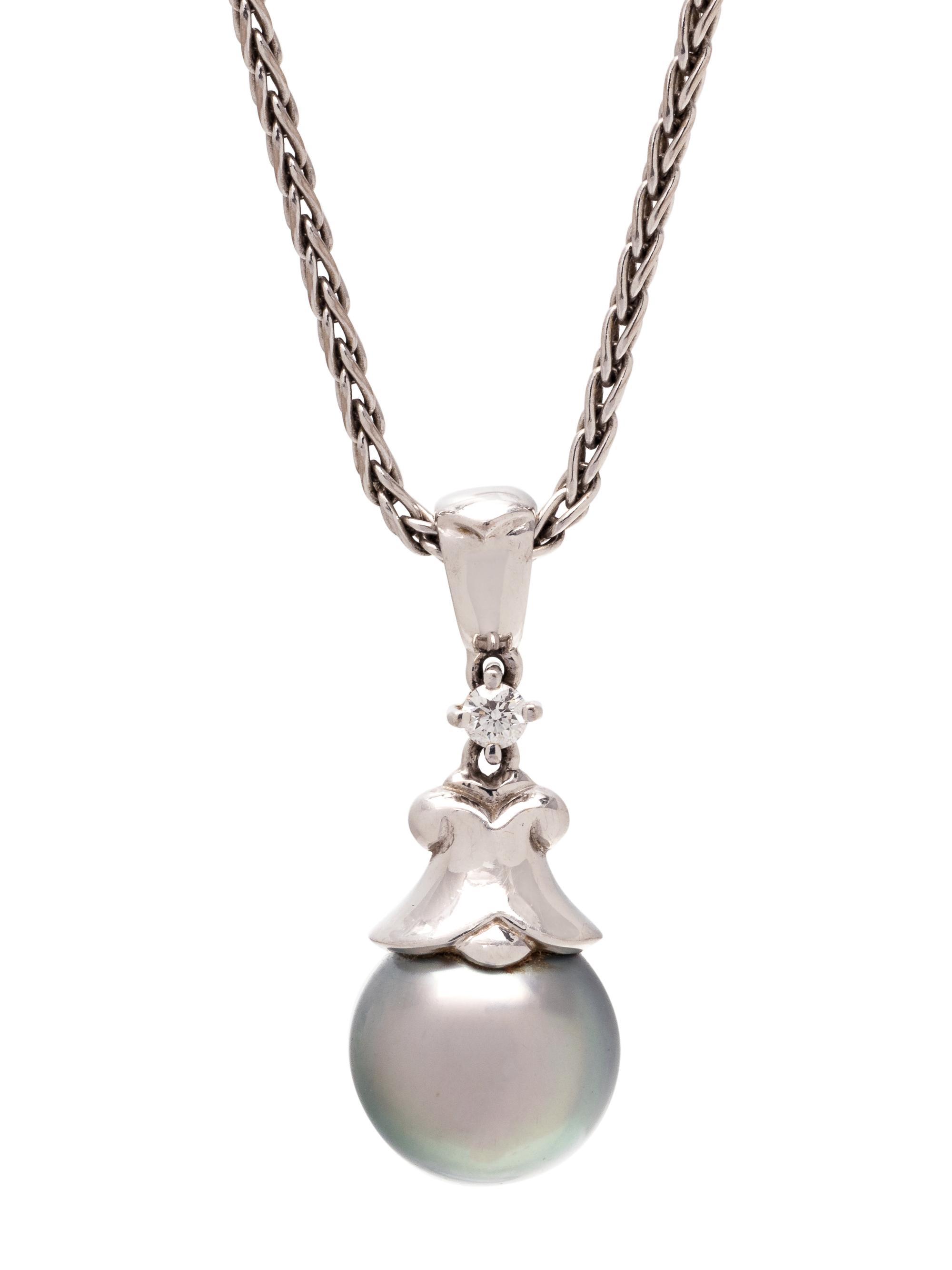 MIKIMOTO, CULTURED TAHITIAN PEARL AND DIAMOND PENDANT