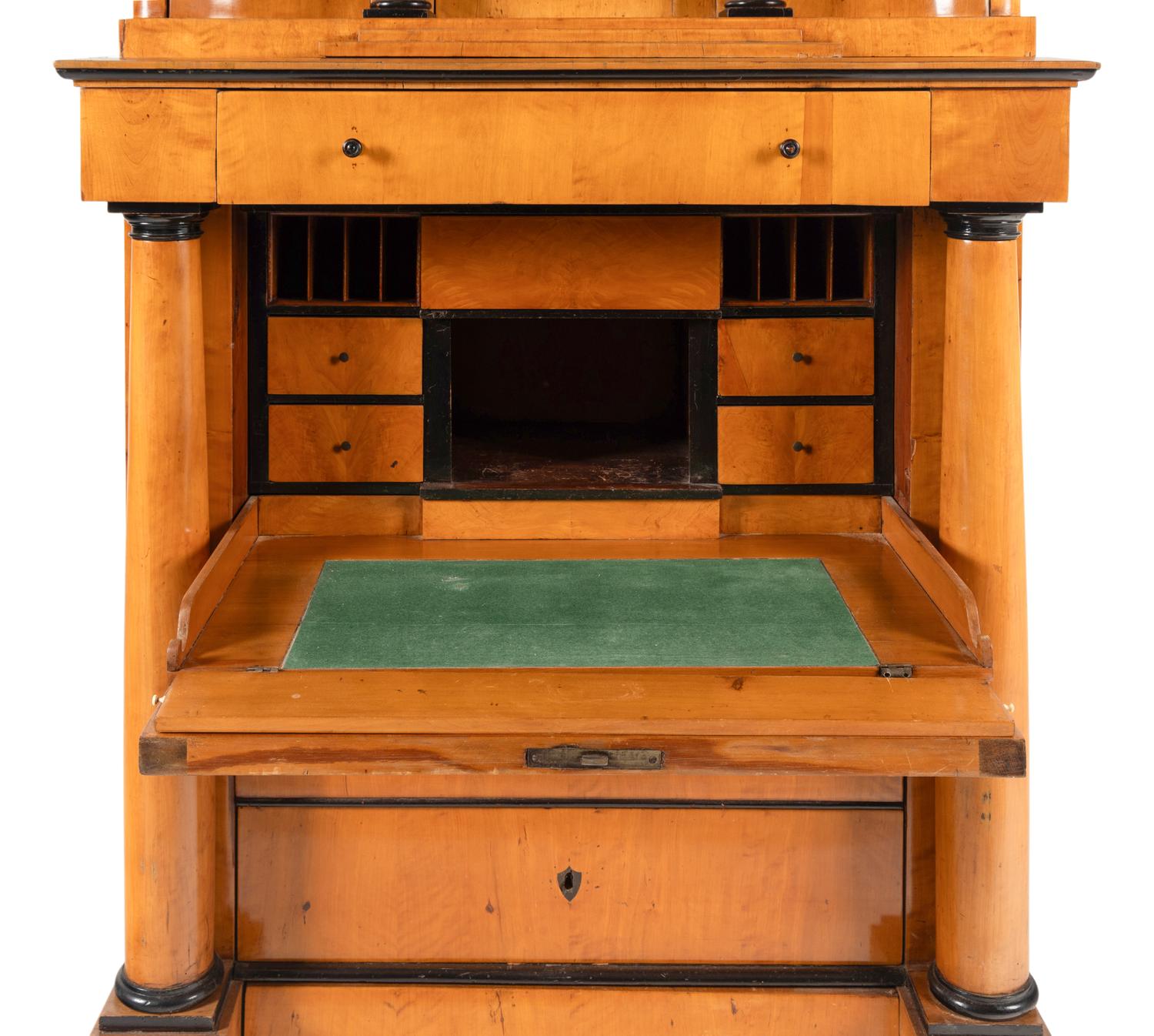 A Biedermeier Part-Ebonized Birch Bureau Cabinet
