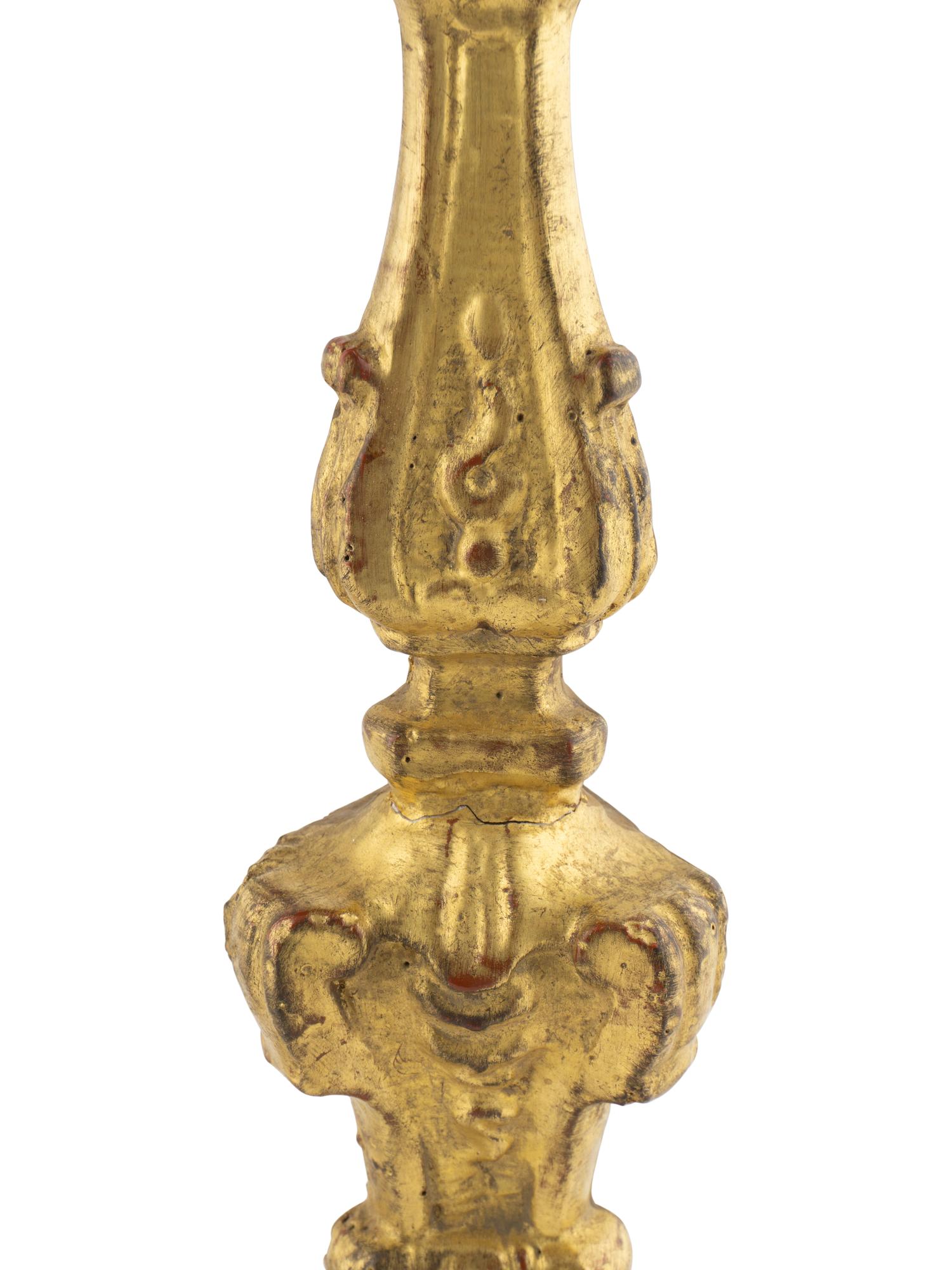 A Pair of Continental Giltwood Prickets