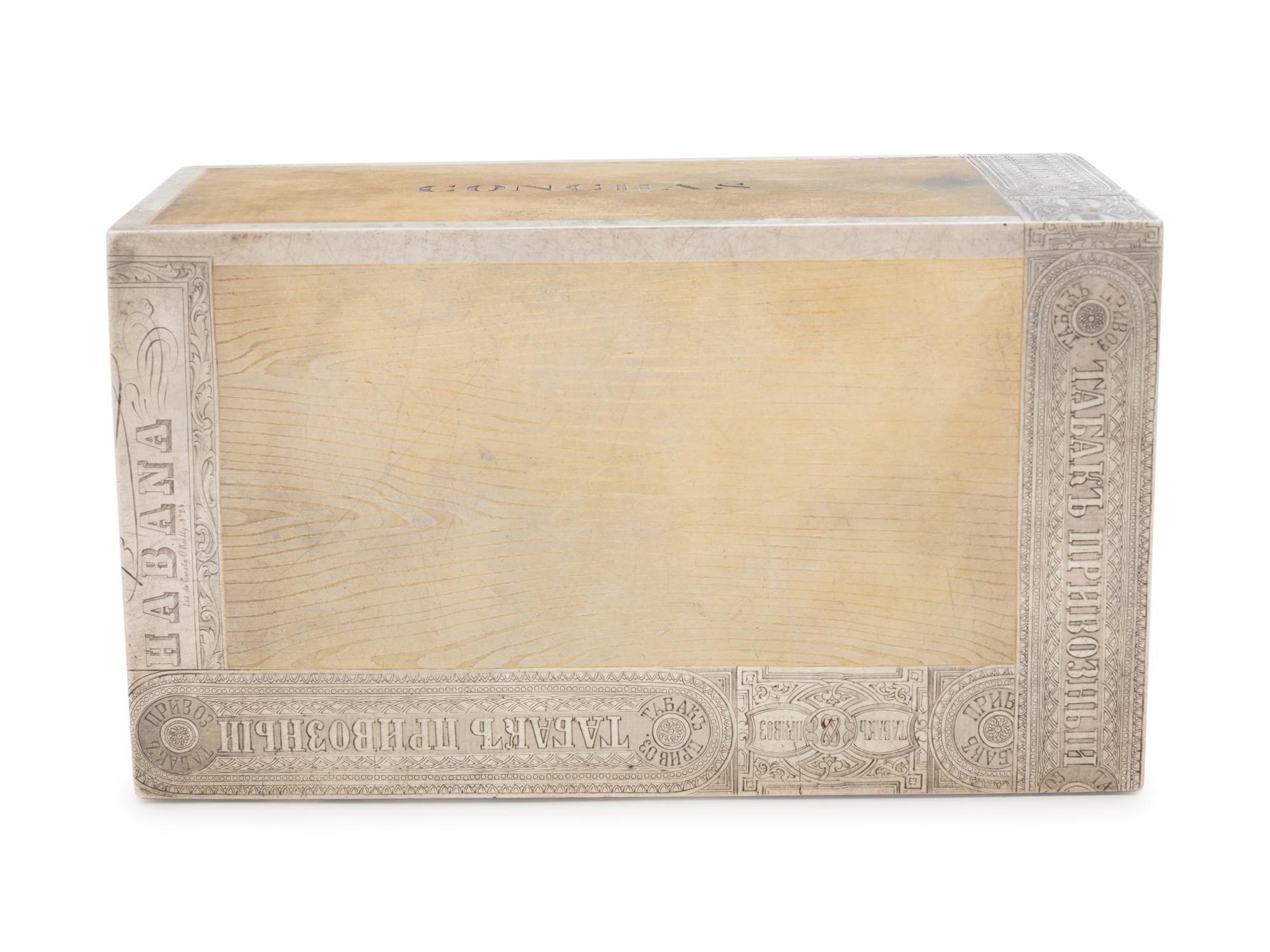 A Large Russian Silver-Gilt Trompe l'Oeil Cigar Box