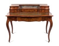 A Burlwood Writing Desk Height 34 x width 47 x depth 26 inches.