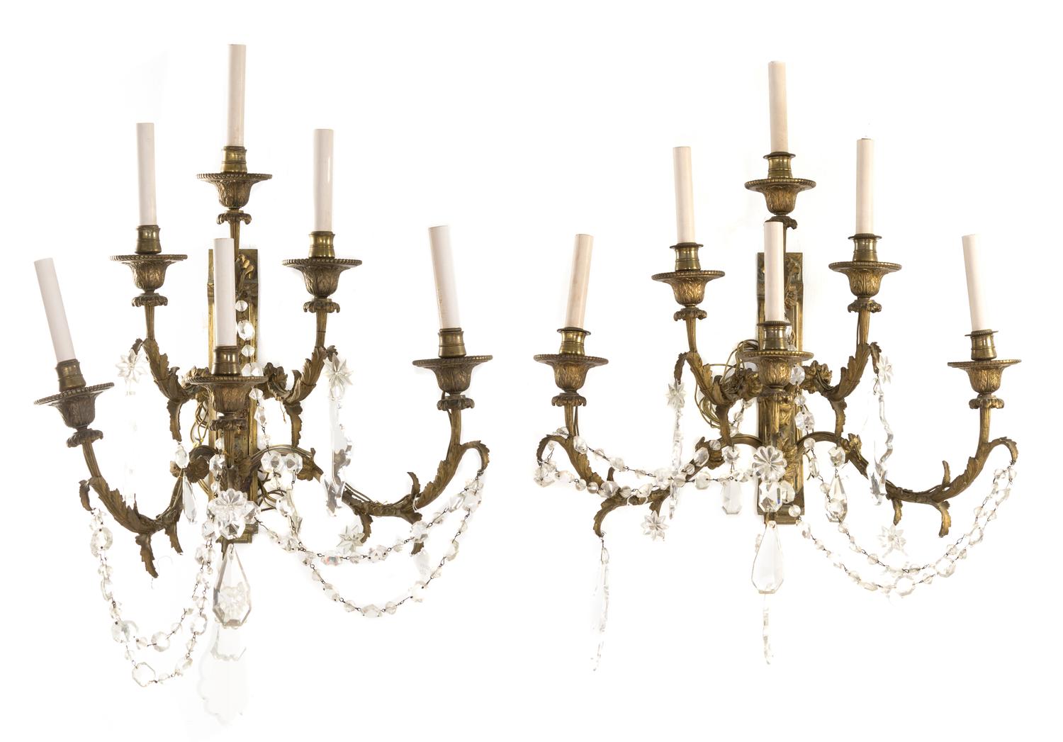 A Pair of Continental Gilt Bronze Six-Light Sconces Height 26 inches.