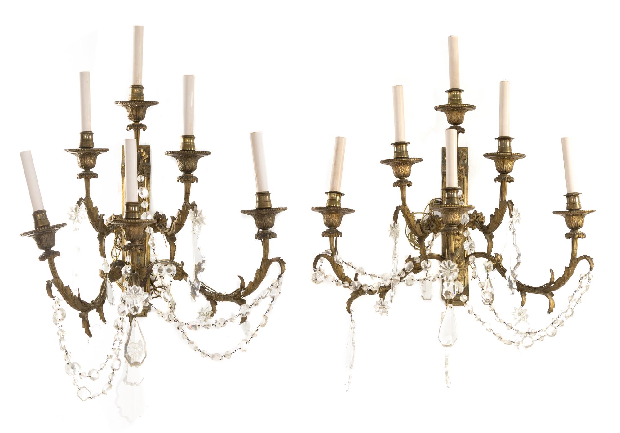 A Pair of Continental Gilt Bronze Six-Light Sconces Height 26 inches.