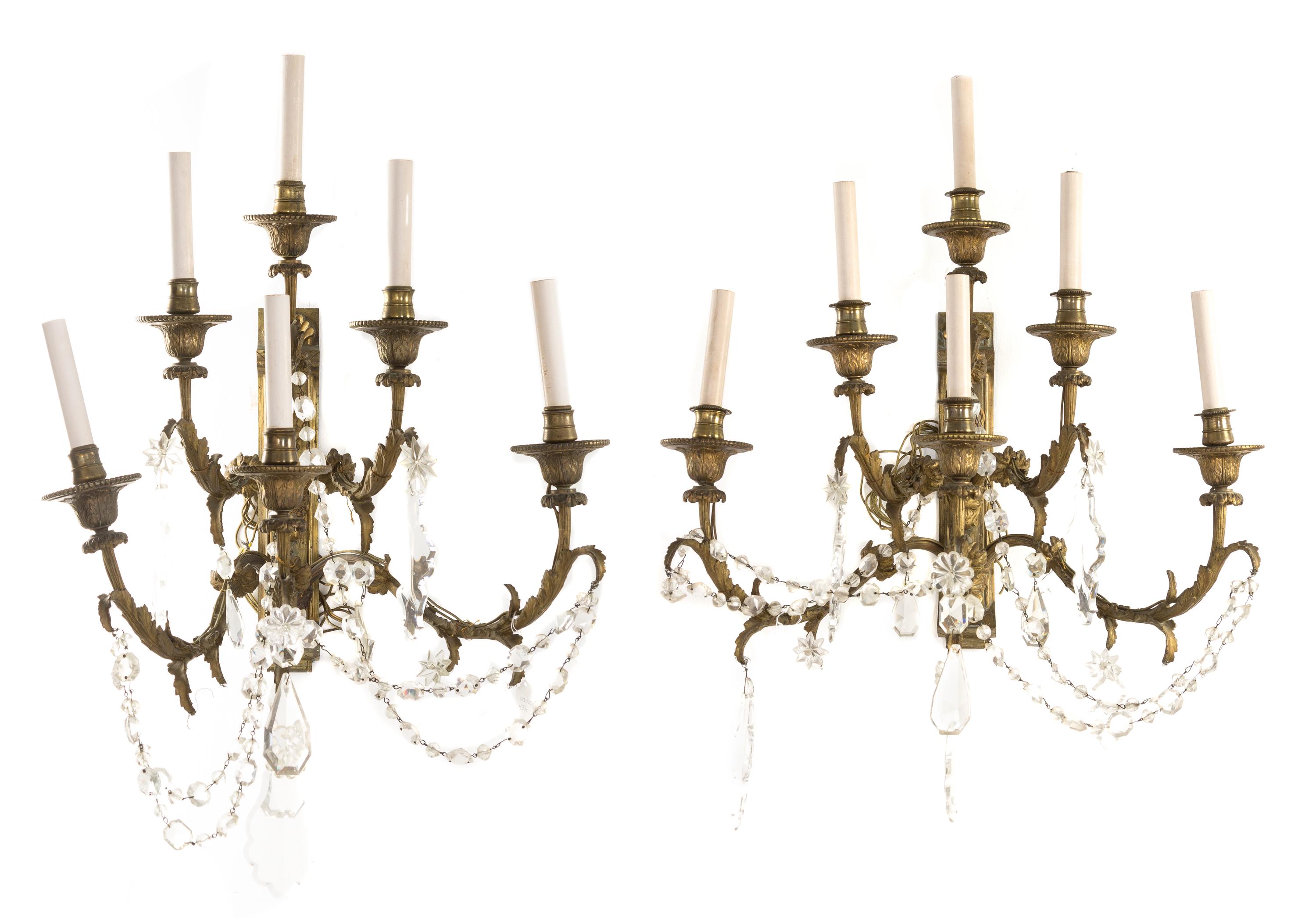 A Pair of Continental Gilt Bronze Six-Light Sconces Height 26 inches.