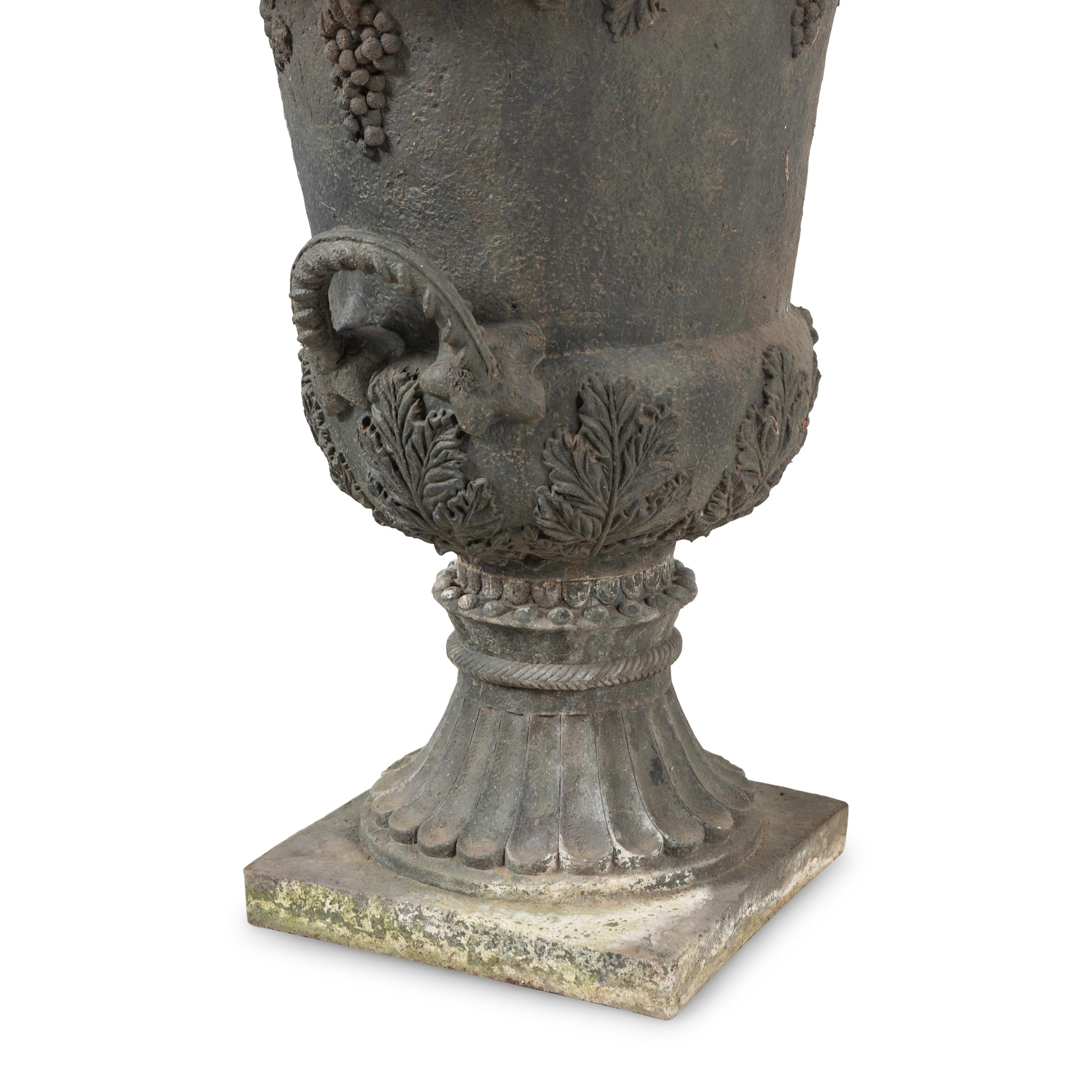 A Pair of Composition Garden Urns
