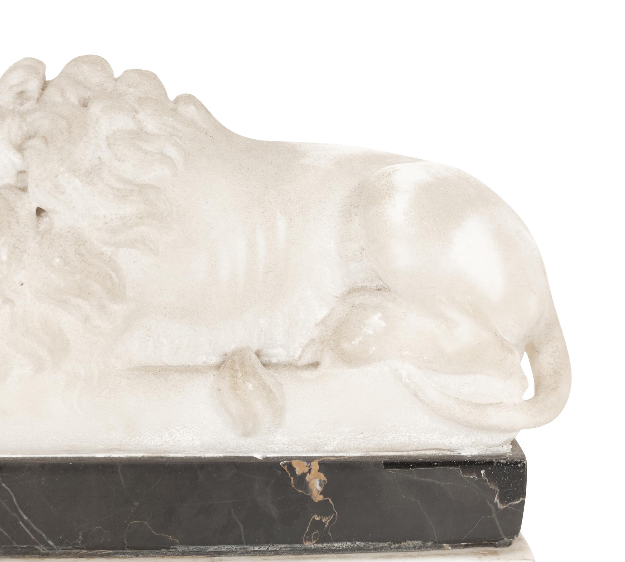 A Pair of Marble Recumbent Lion Bookends