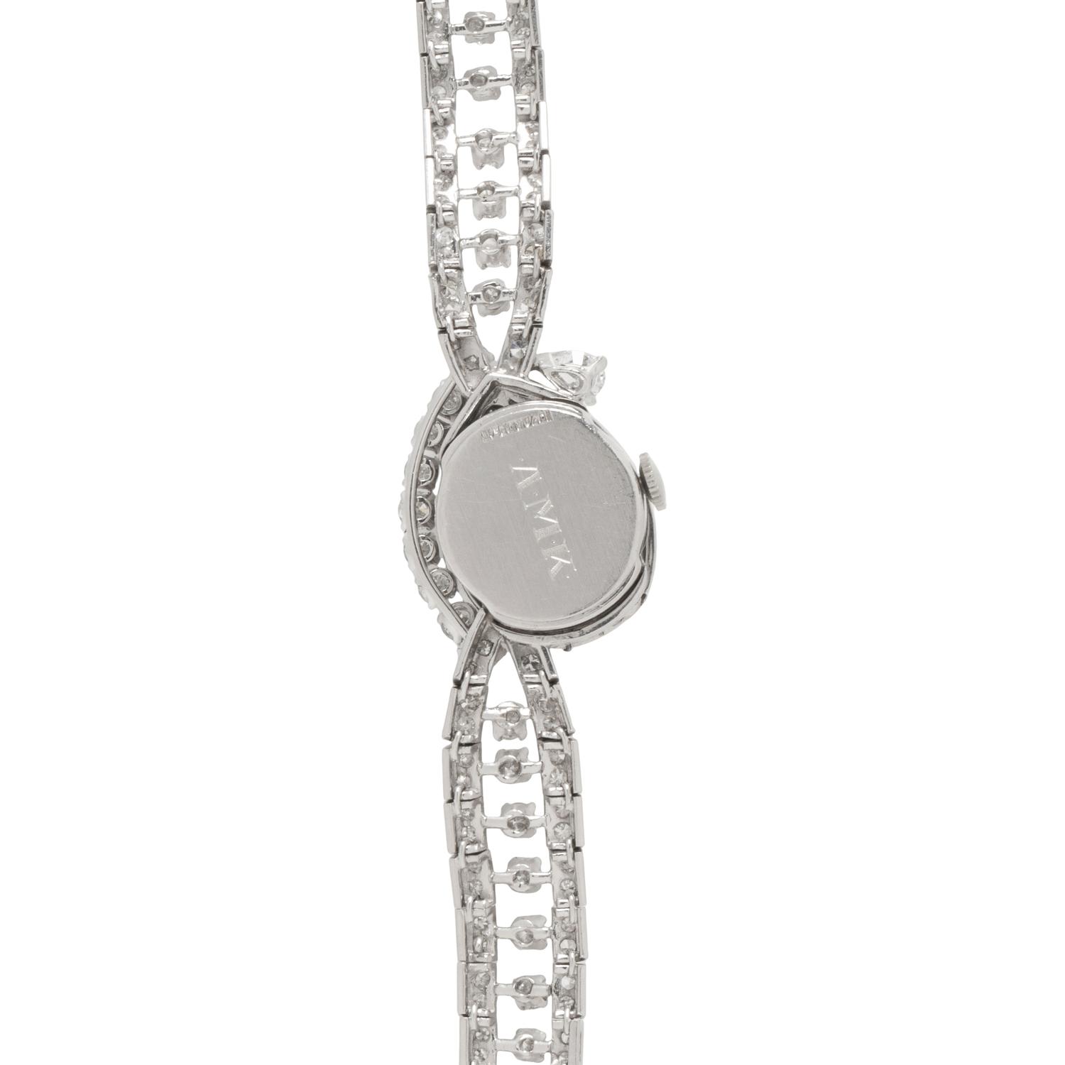 HAMILTON, PLATINUM AND DIAMOND SURPRISE WATCH