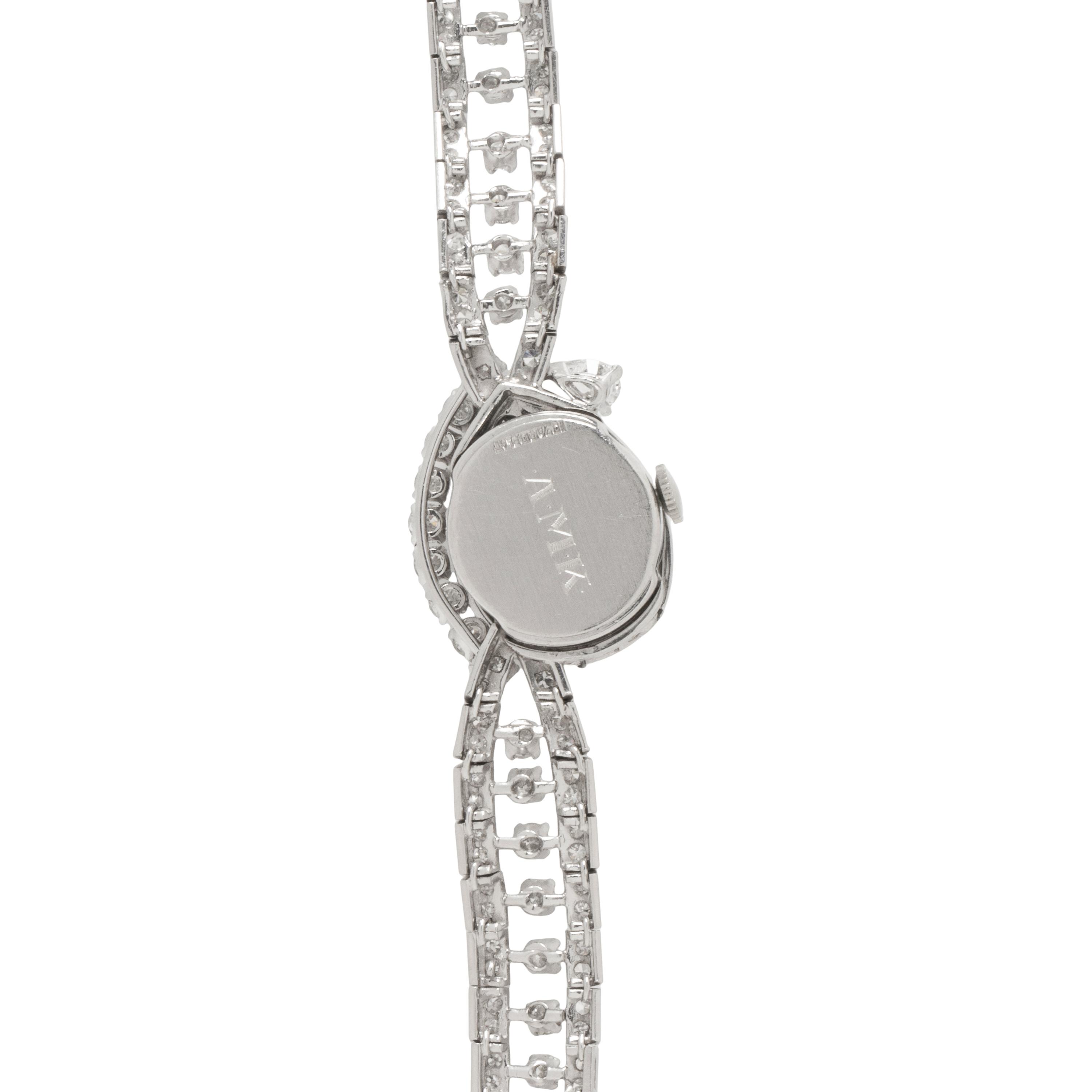 HAMILTON, PLATINUM AND DIAMOND SURPRISE WATCH