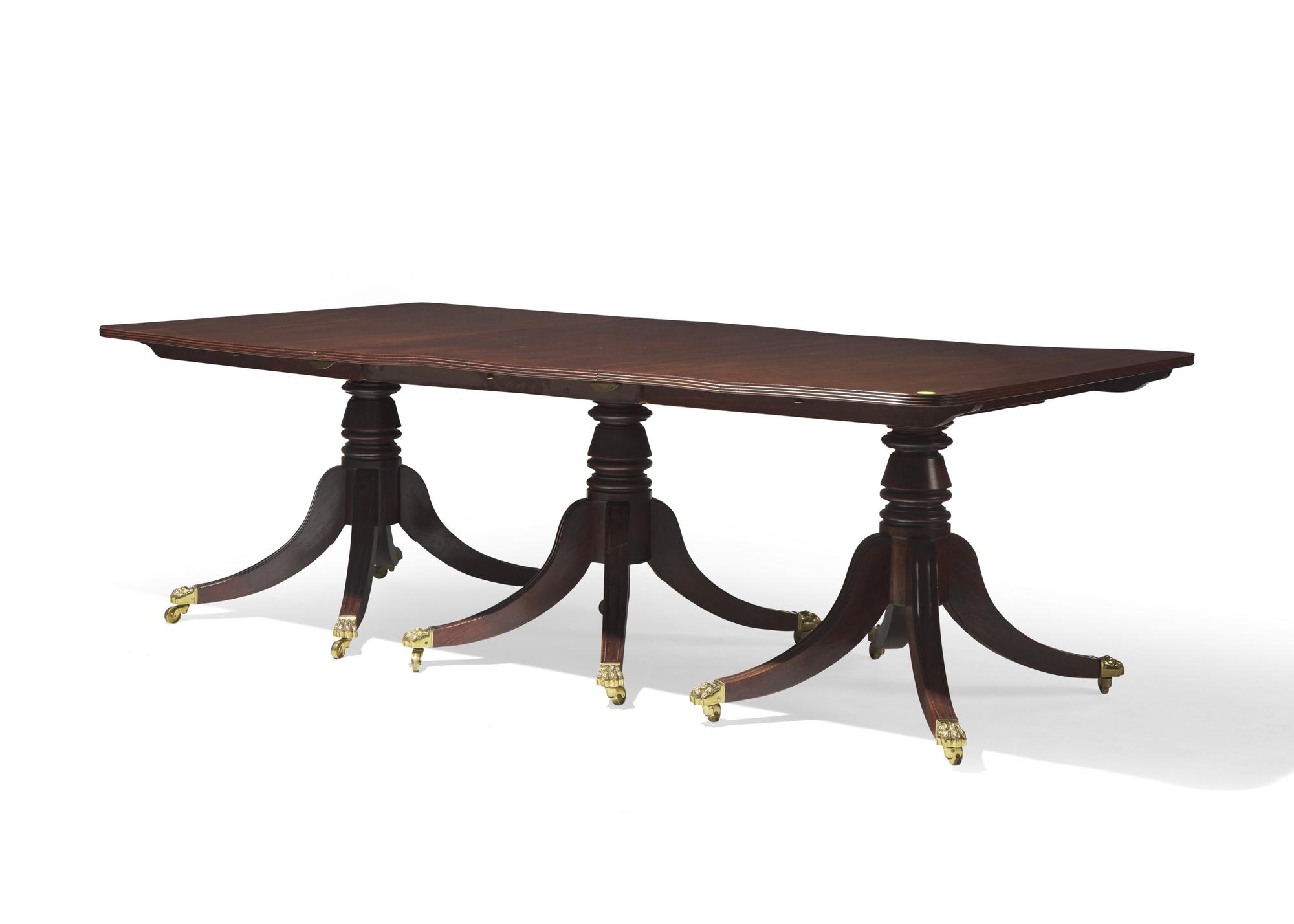 A Regency three-part mahogany dining table, circa 1820