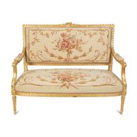 A Louis XVI Style Giltwood Five-Piece Salon Suite