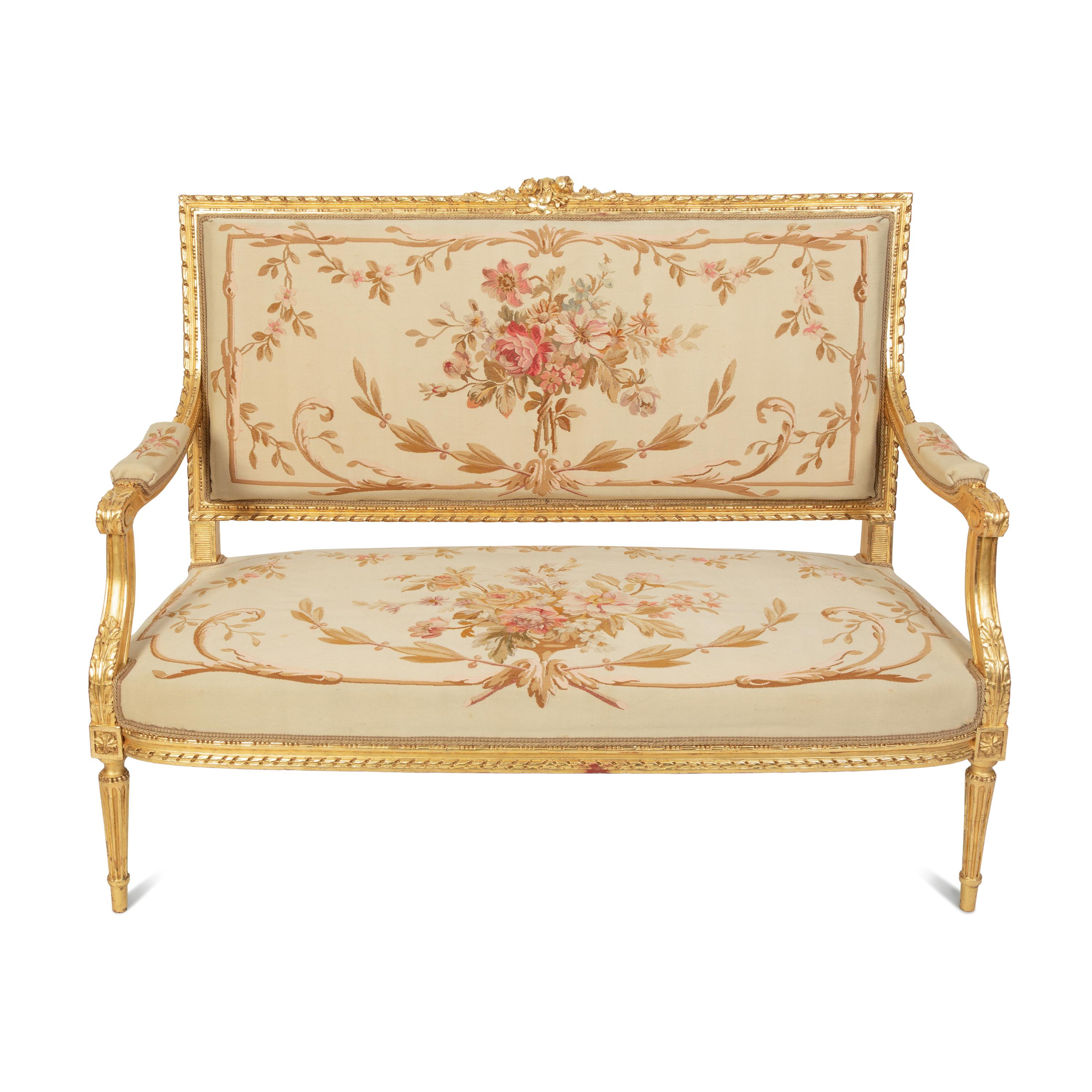 A Louis XVI Style Giltwood Five-Piece Salon Suite