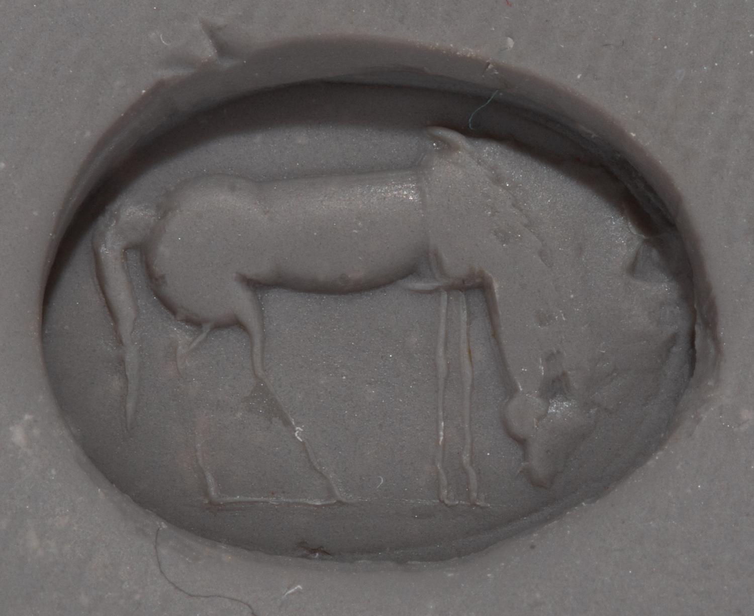 A Roman Red Jasper Ring Stone with a Grazing Horse