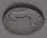 A Roman Red Jasper Ring Stone with a Grazing Horse