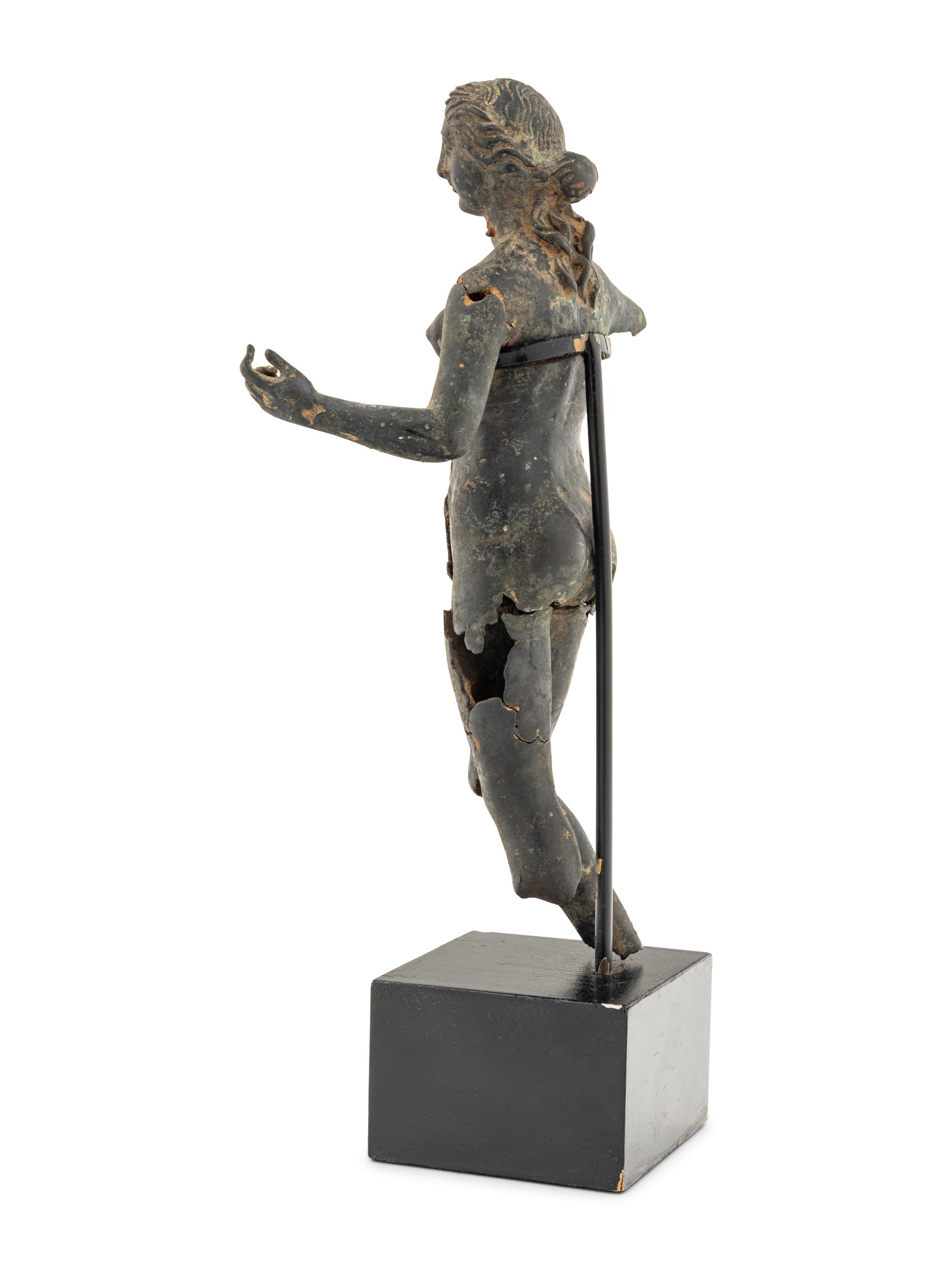 A Fragmentary Bronze Female Figure