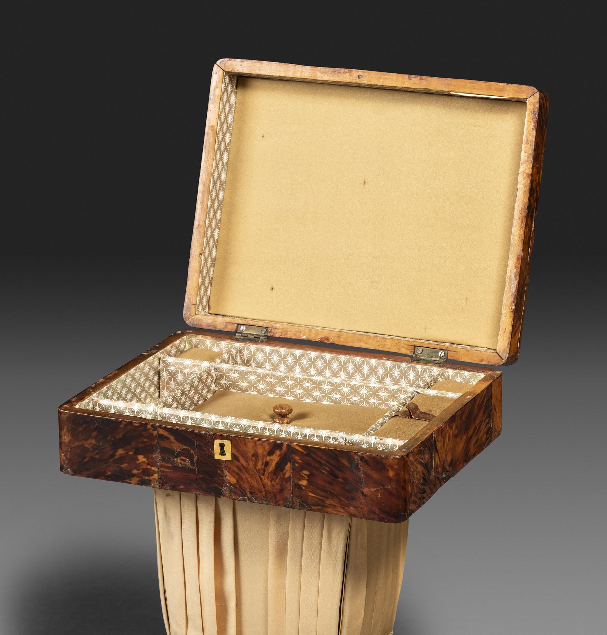 A Regency Tortoiseshell Veneered Sewing Table