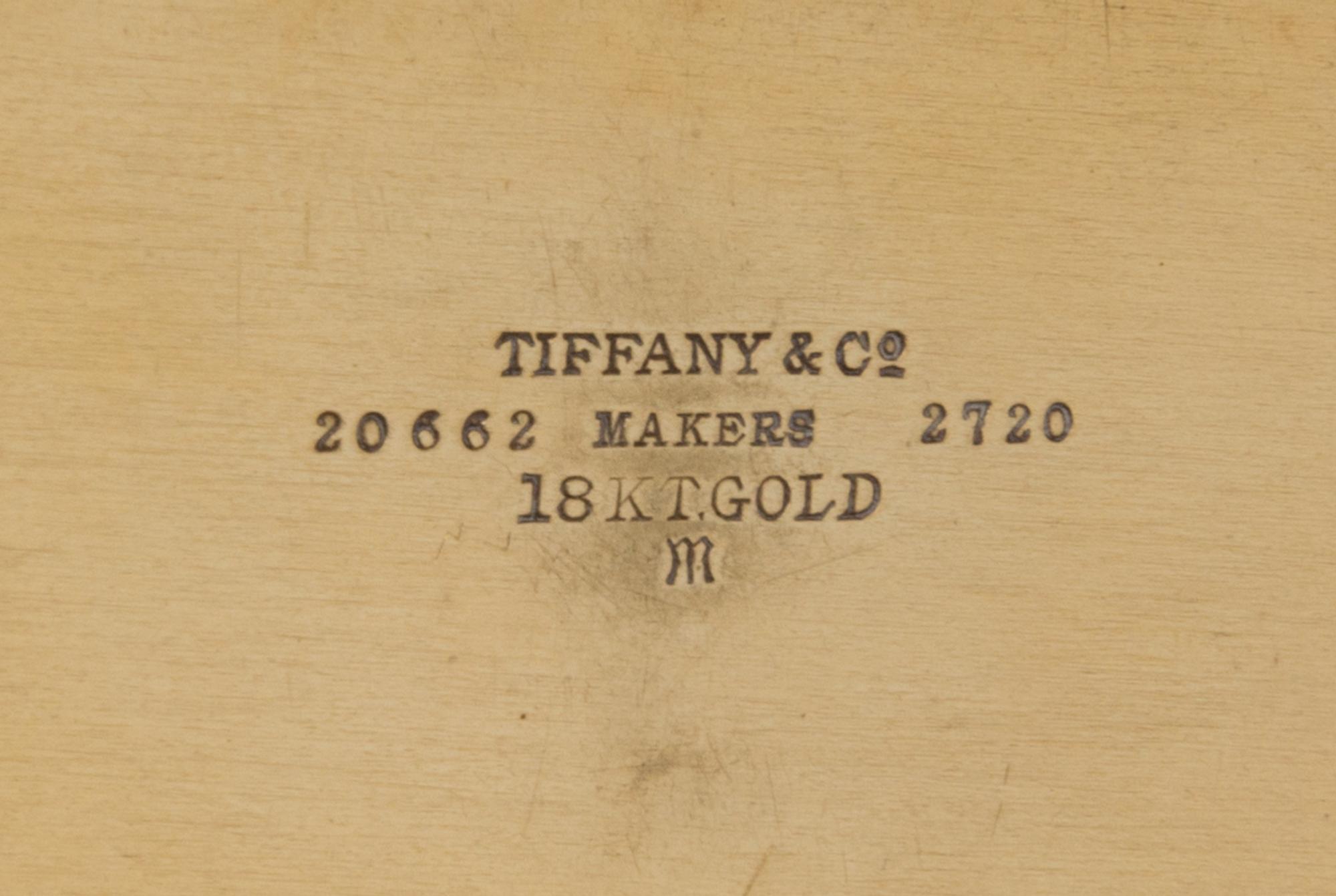An American 18 Karat Gold Mounted Nine-Piece Dressing Set, Tiffany & Co., New York, NY, Circa 1925, all engraved with an art deco monog