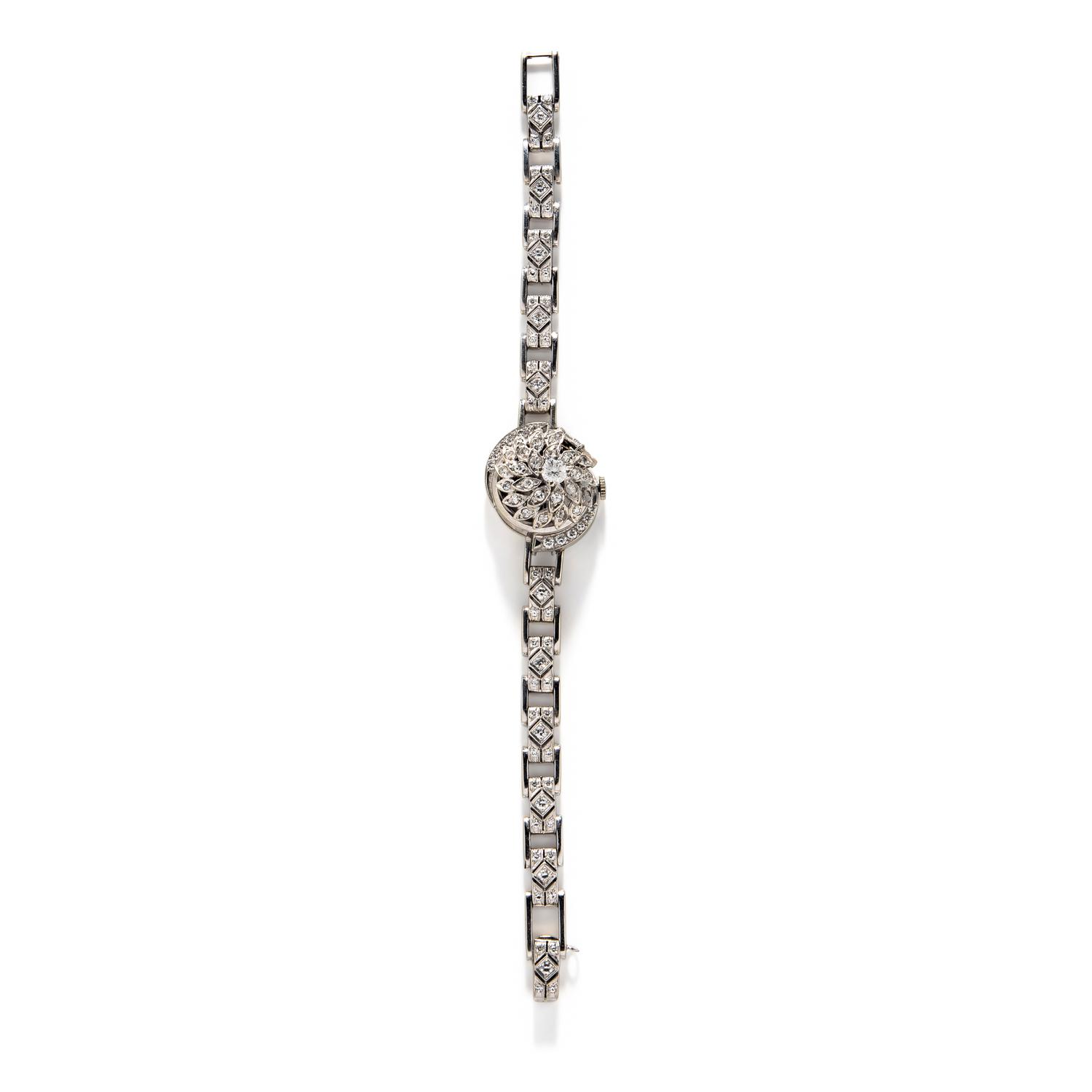 HAMILTON, 14K WHITE GOLD AND DIAMOND SURPRISE WATCH