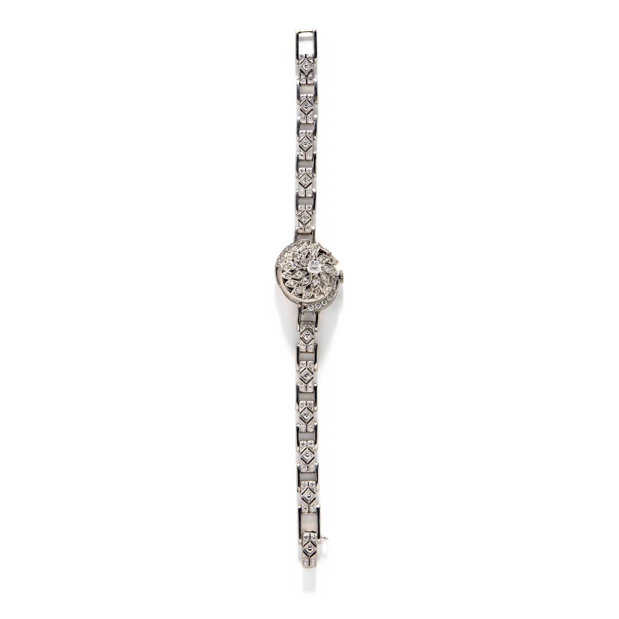 HAMILTON, 14K WHITE GOLD AND DIAMOND SURPRISE WATCH