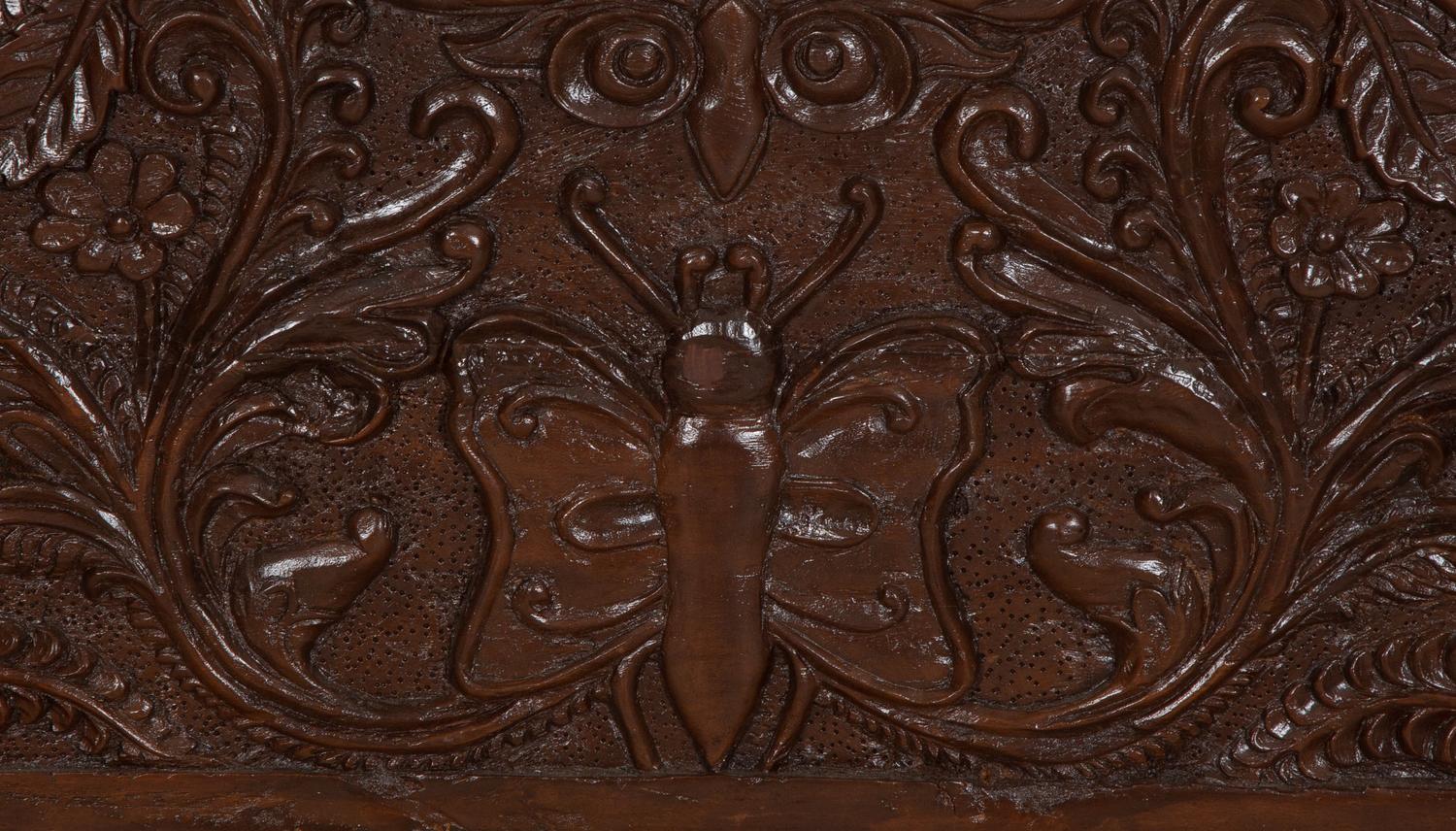 A British Colonial Carved Mahogany and Cane Work Settee