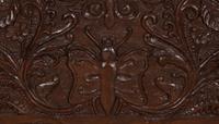 A British Colonial Carved Mahogany and Cane Work Settee