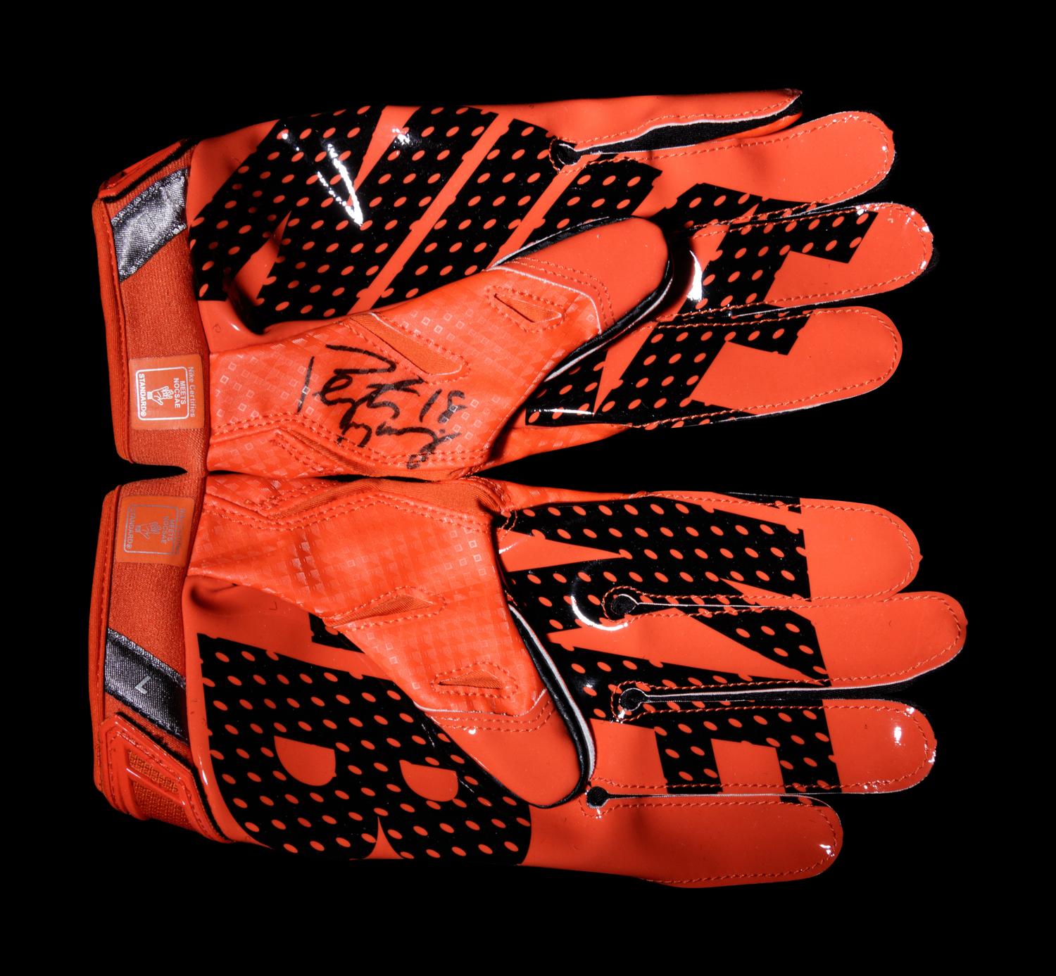 A Pair of Peyton Manning Signed Nike Football Gloves,