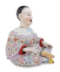 A German Porcelain "Nodder" Figure