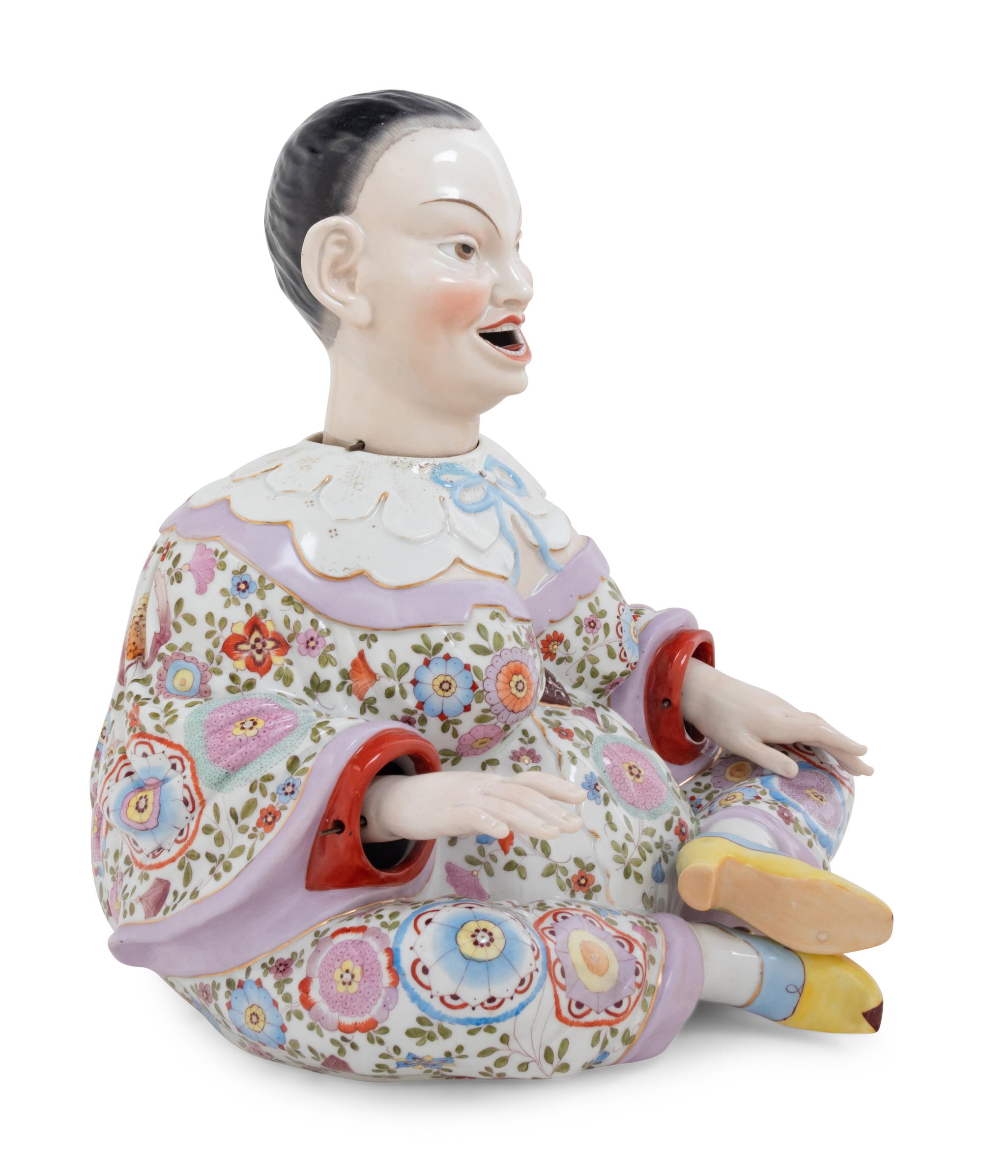 A German Porcelain "Nodder" Figure