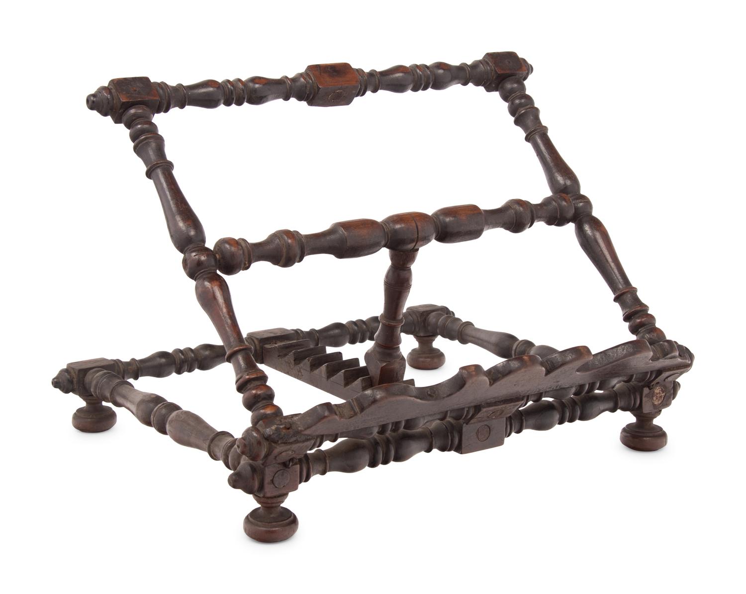 An Italian Carved Walnut Book Stand