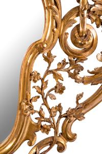 An Italian Baroque Style Giltwood Mirror