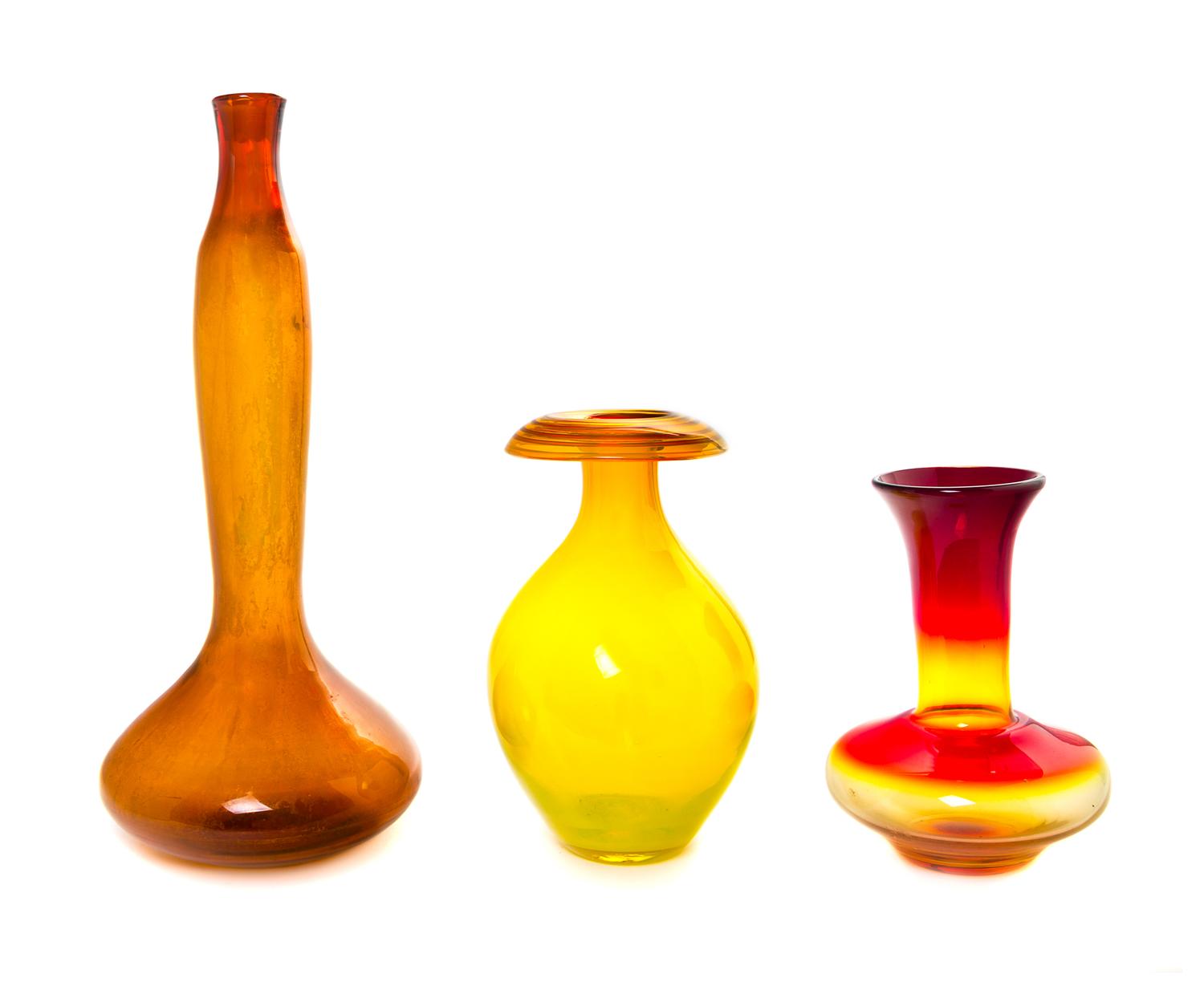 A Blenko Glass Decanter Height of tallest 25 inches. — 20TH CENTURY
