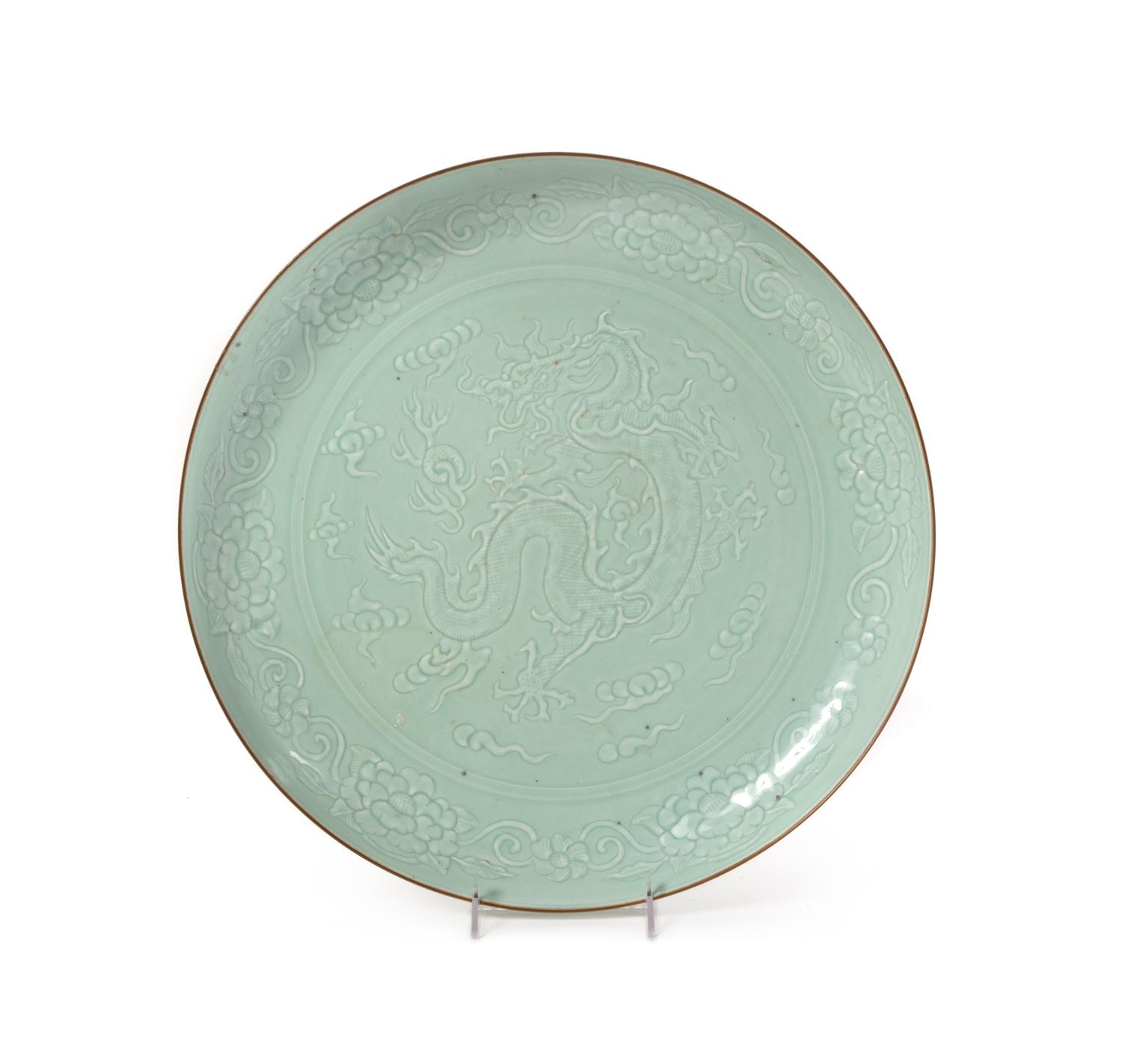 A Large Carved Celadon Glazed Porcelain Charger