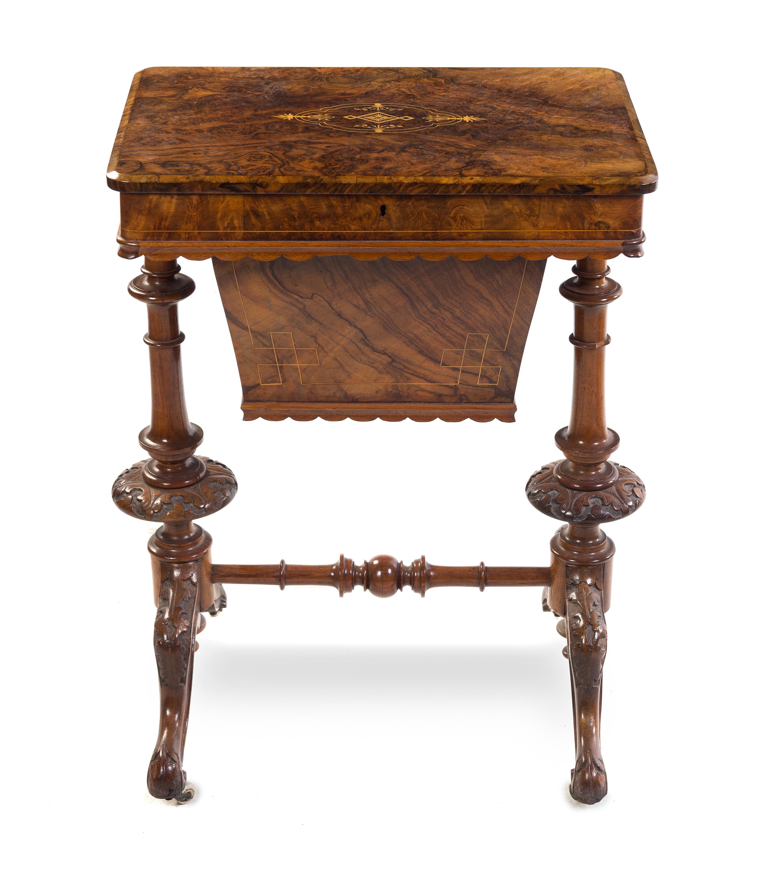 A Victorian Burl Walnut and Marquetry Sewing Table Height 28 7/8 x width 21 x depth 15 1/4 inches.