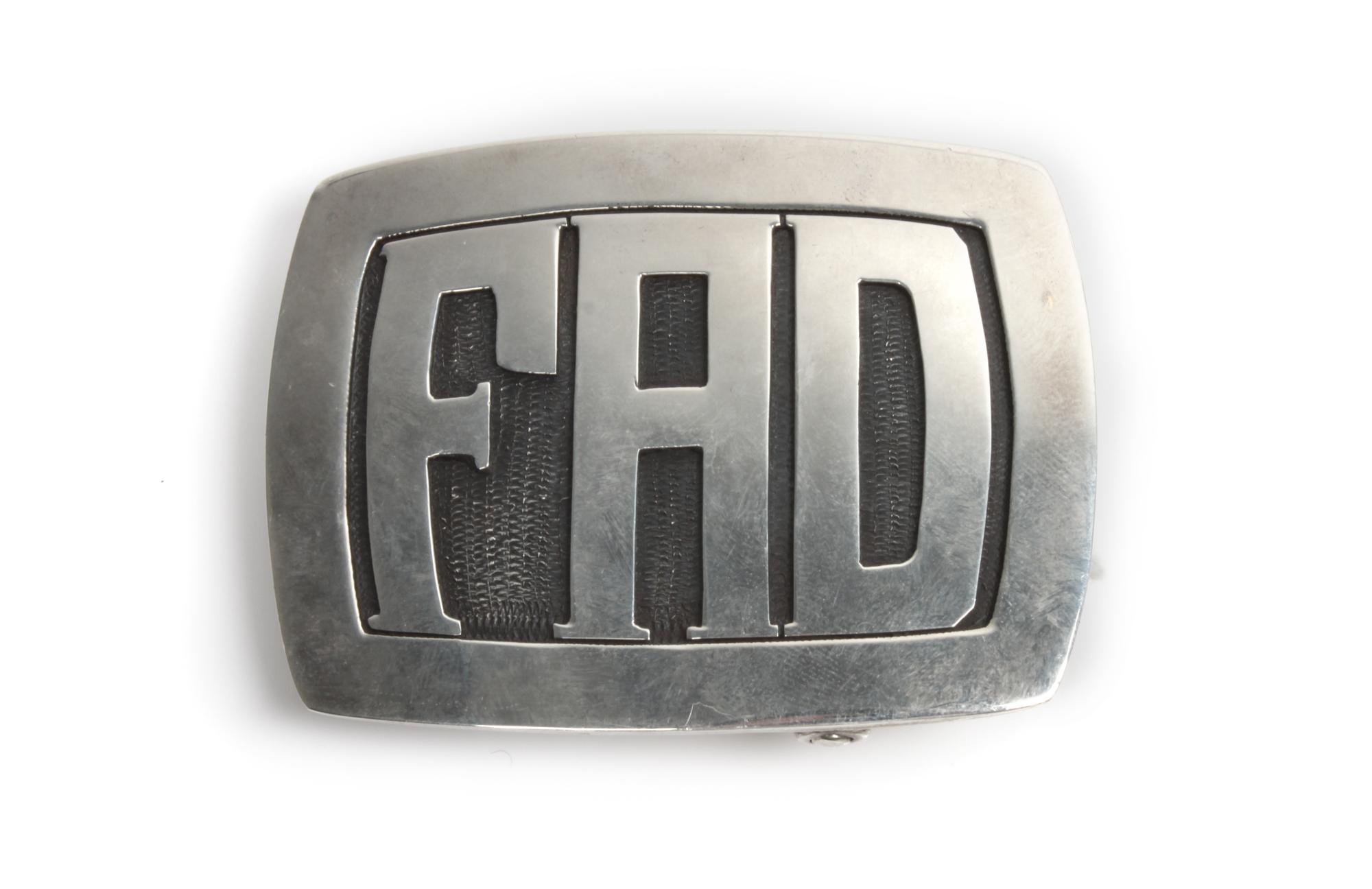 A Silver Monogrammed Belt Buckle, F A D., Julian Lavato (Kewa, b. 1925) Height 2 x width 2 3/4 inches.