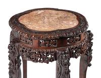 A Chinese Carved Hardwood Marble-Inset Side Table