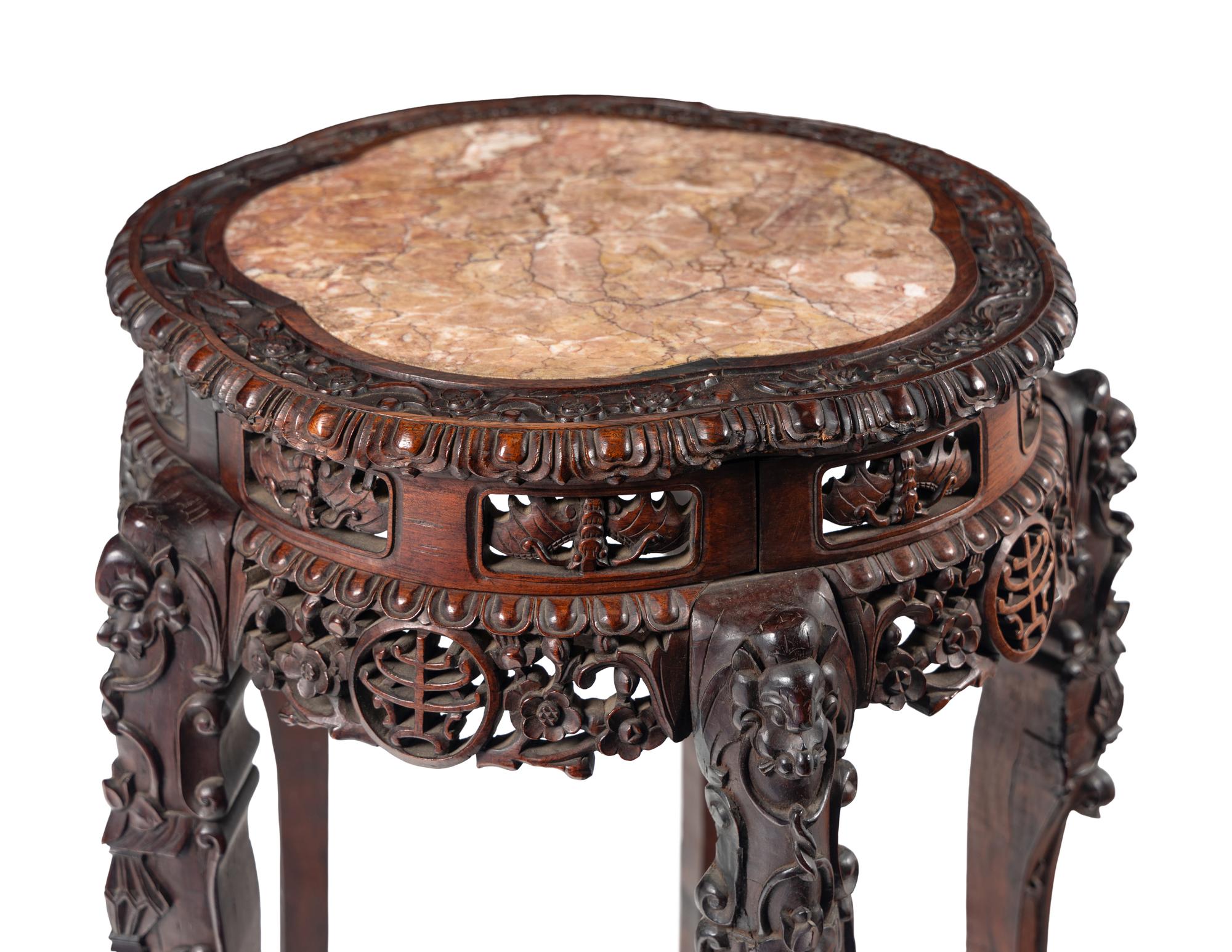A Chinese Carved Hardwood Marble-Inset Side Table