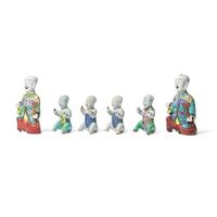 A Group of Six Chinese Export Porcelain "Laughing Boy" Figures