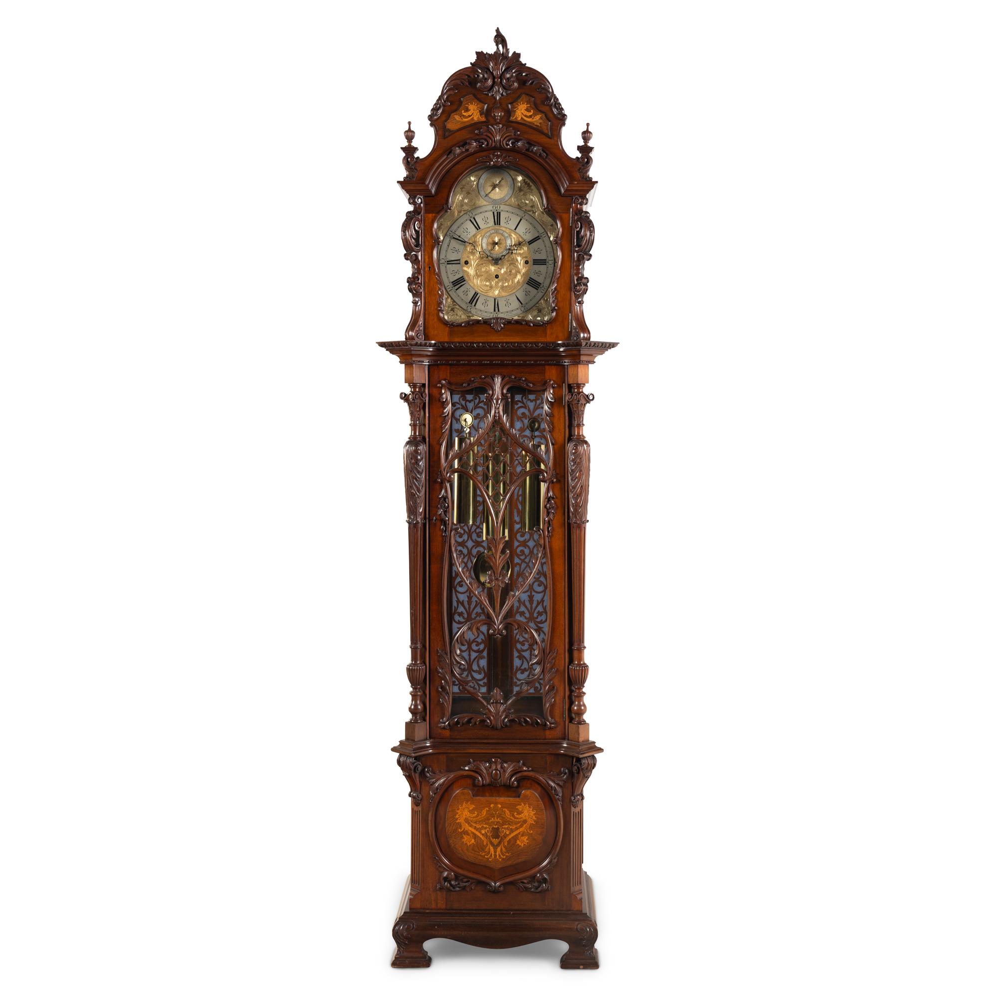 An English Carved Walnut Tall Case Clock