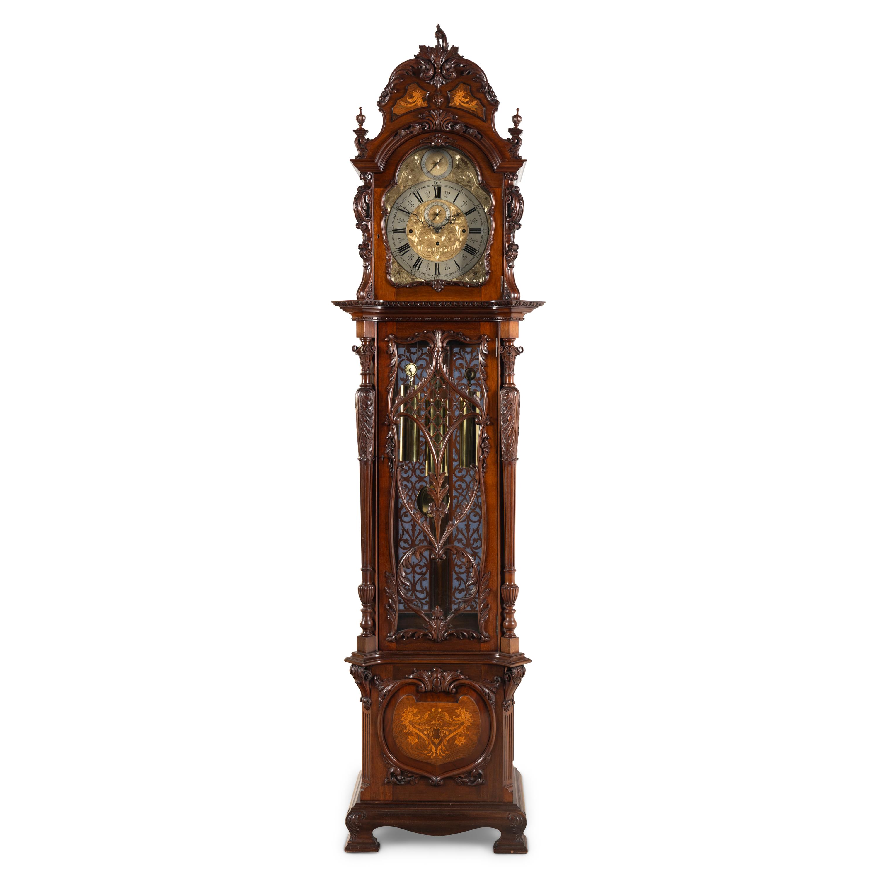 An English Carved Walnut Tall Case Clock