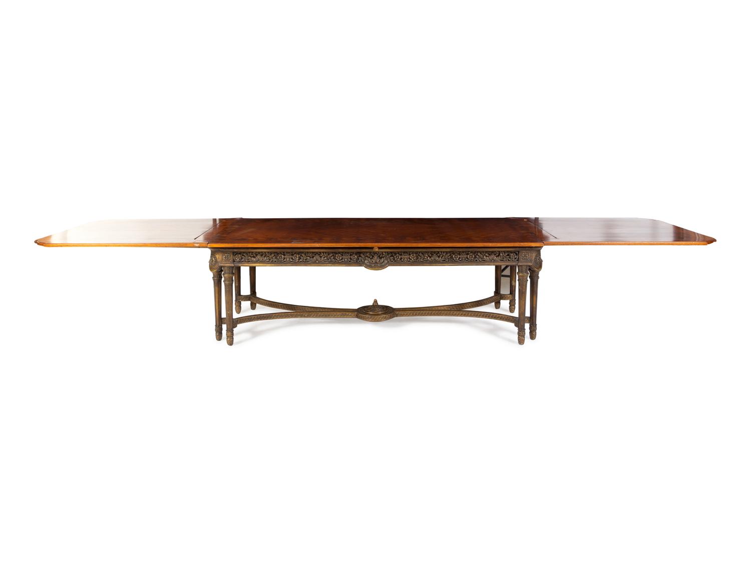 A Louis XVI Style Marquetry Dining Table