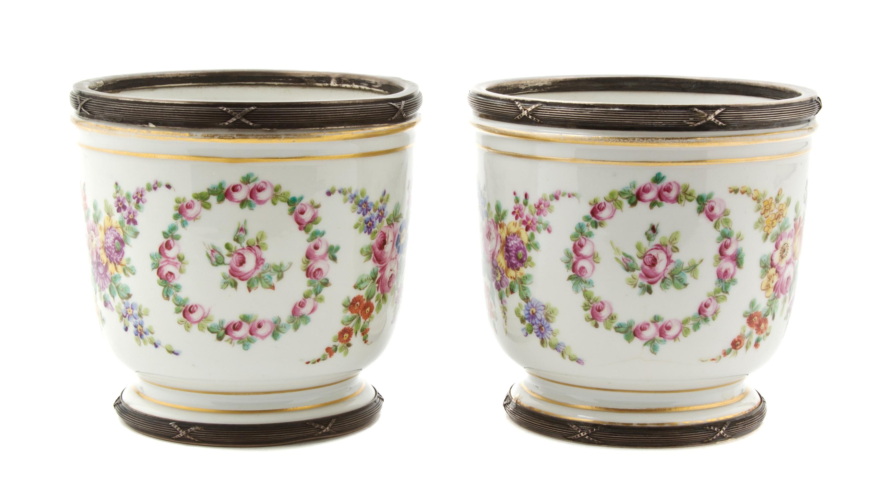 A Pair of Sevres Style Porcelain and French Silver Mounted Cache Pots, Height 5 inches.