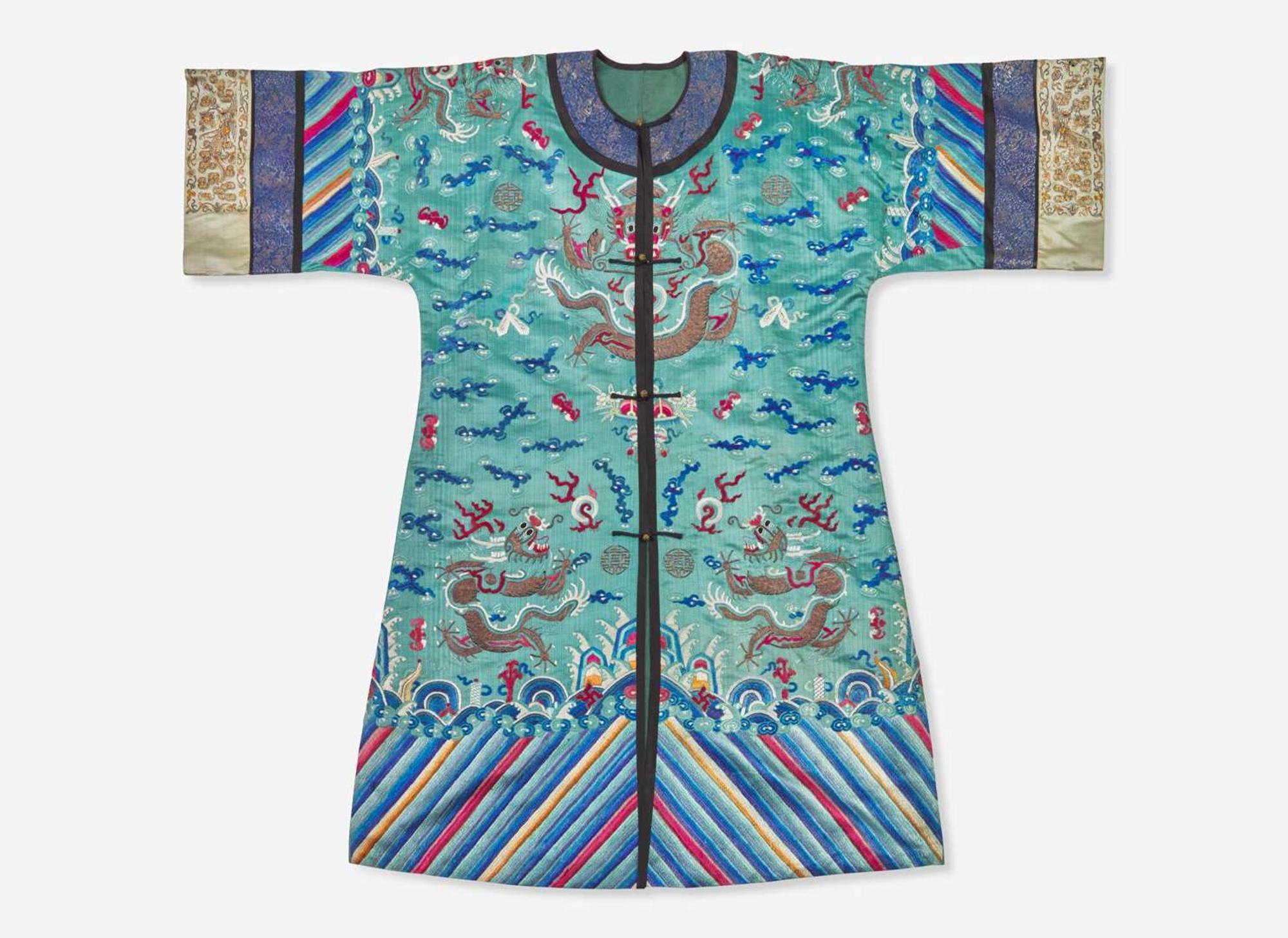 A Chinese embroidered teal blue silk "Dragon" surcoat, late 19th to 20th century 刺繡青藍龍紋袍 十九或二十世紀