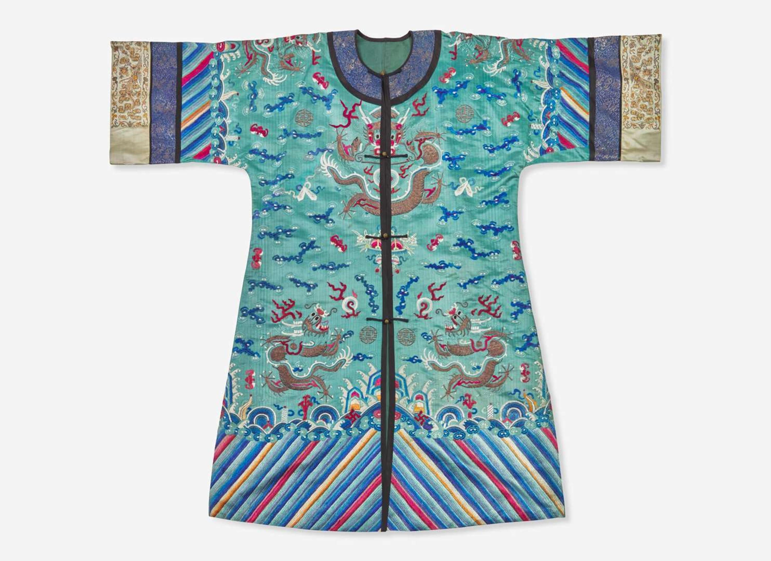 A Chinese embroidered teal blue silk "Dragon" surcoat, late 19th to 20th century 刺繡青藍龍紋袍 十九或二十世紀