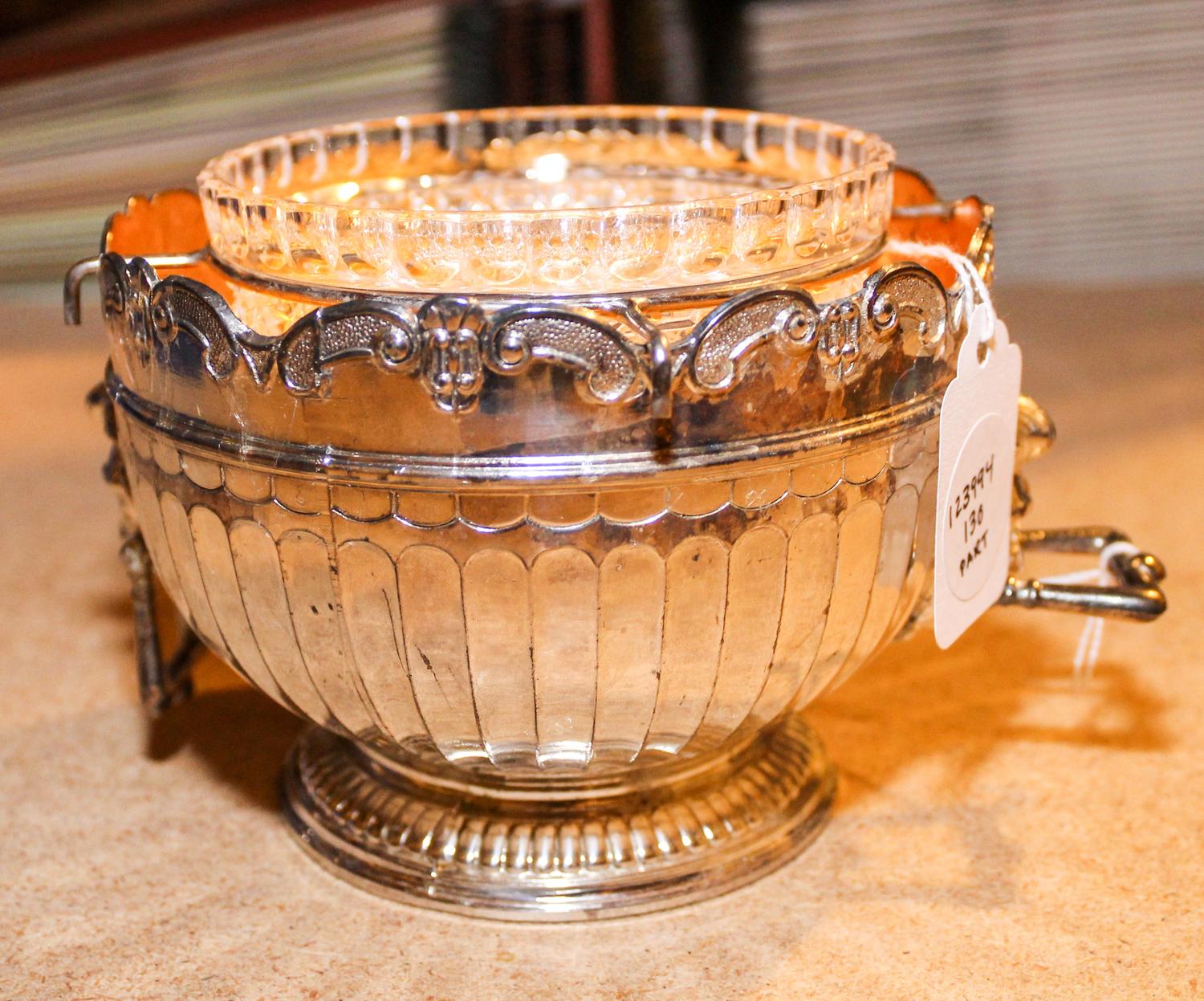 A Silver-Plate Caviar Service Width over handles 5 1/2 inches.