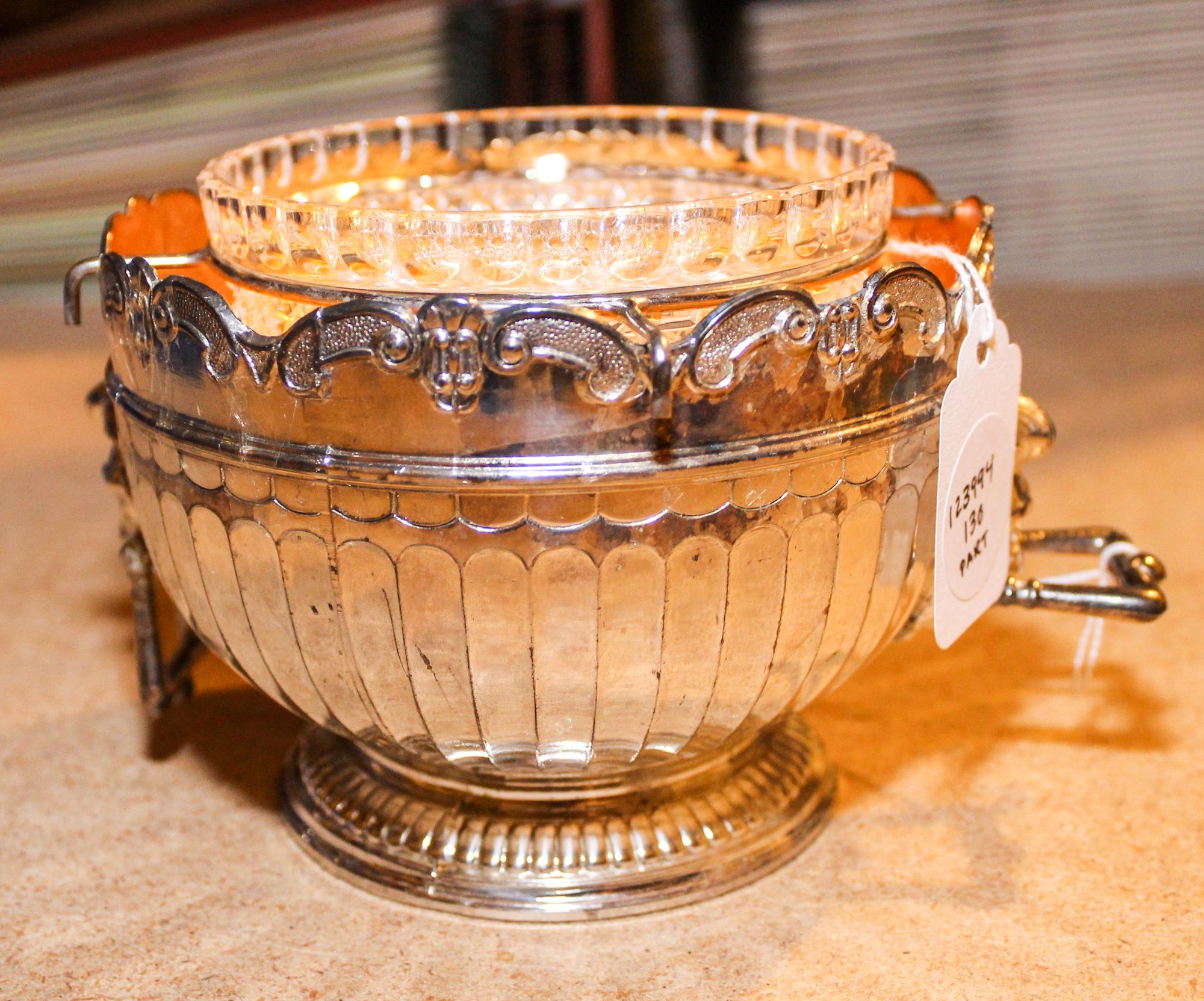 A Silver-Plate Caviar Service Width over handles 5 1/2 inches.