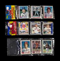 A Group of 1982 Topps Baseball Card Rack Packs with Cal Ripken Jr. Rookie Cards Visible and 1989 Fleer Rack Pack with Billy Ripken Error Visible